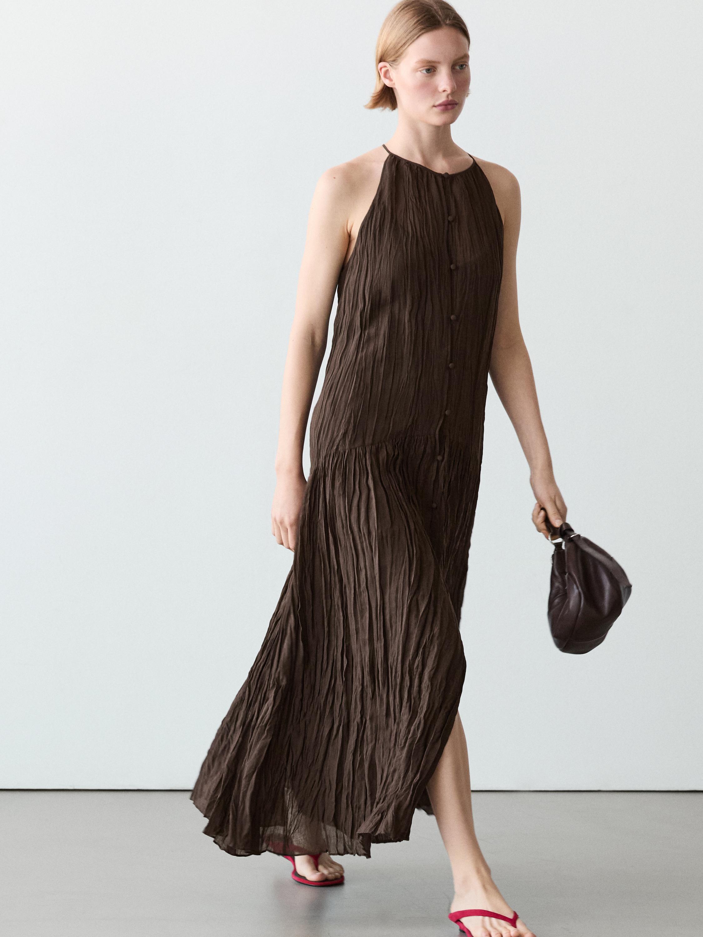 Vestido midi fluido detalle botones