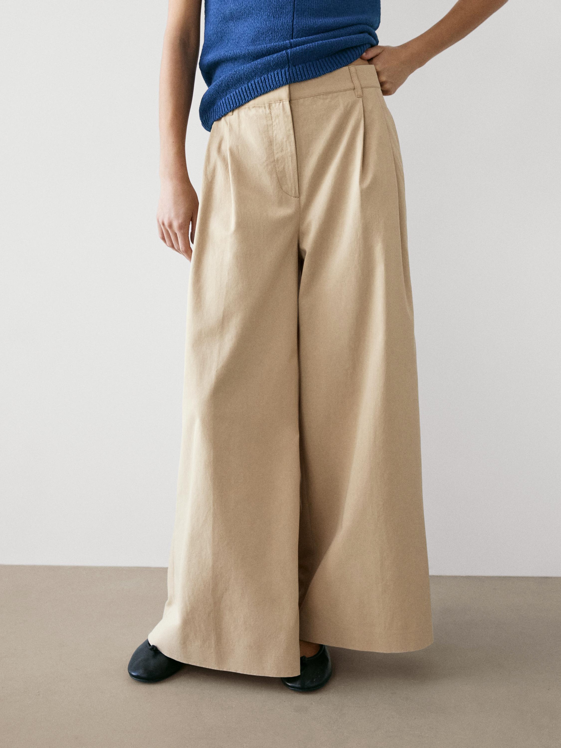 Pantalón fluido detalle pliegues