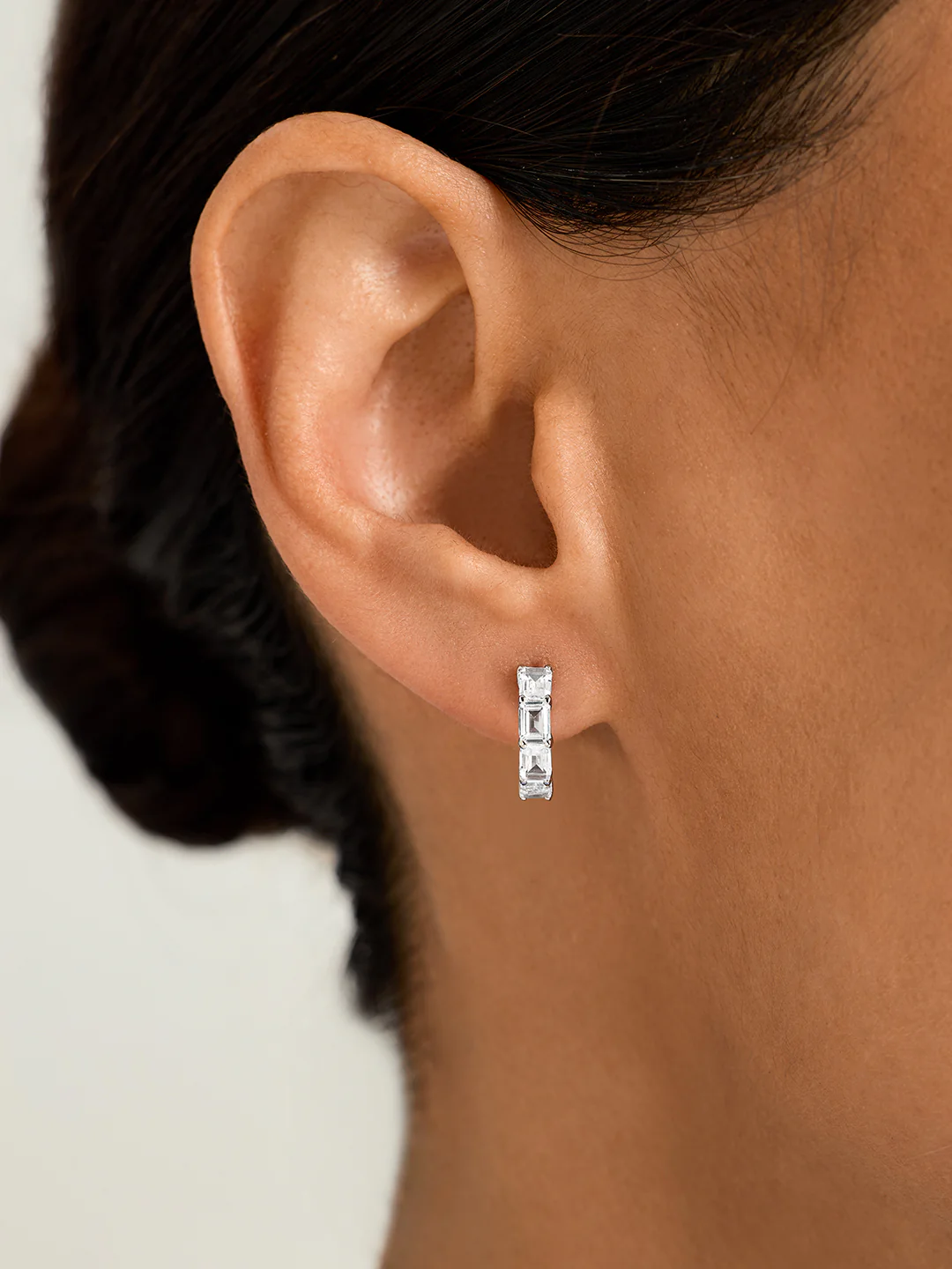 Emerald Cut Sapphire Silver Huggies