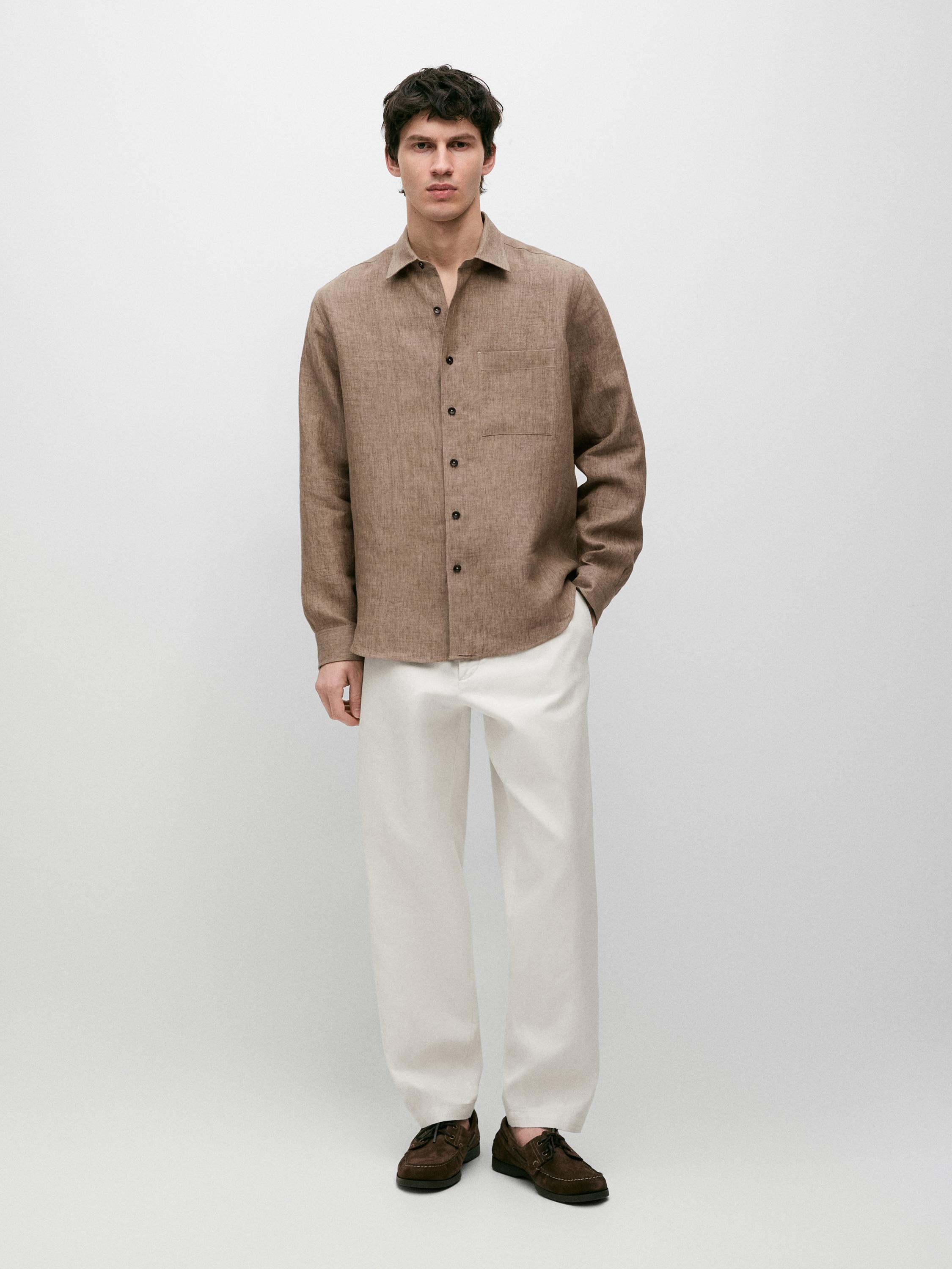 Camisa regular fit delavé detalle bolsillo lino