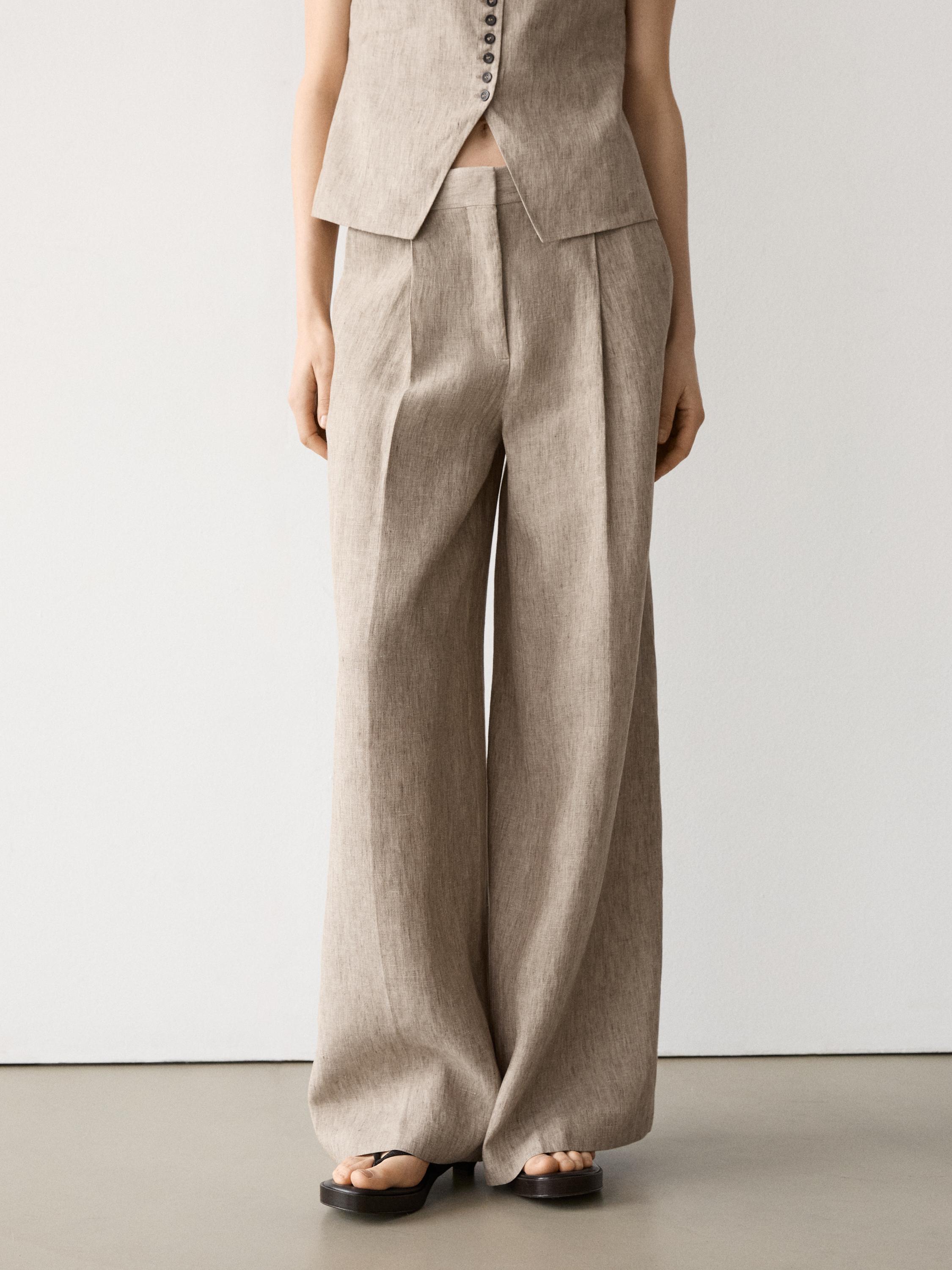 Pantalón melange detalle pliegues lino