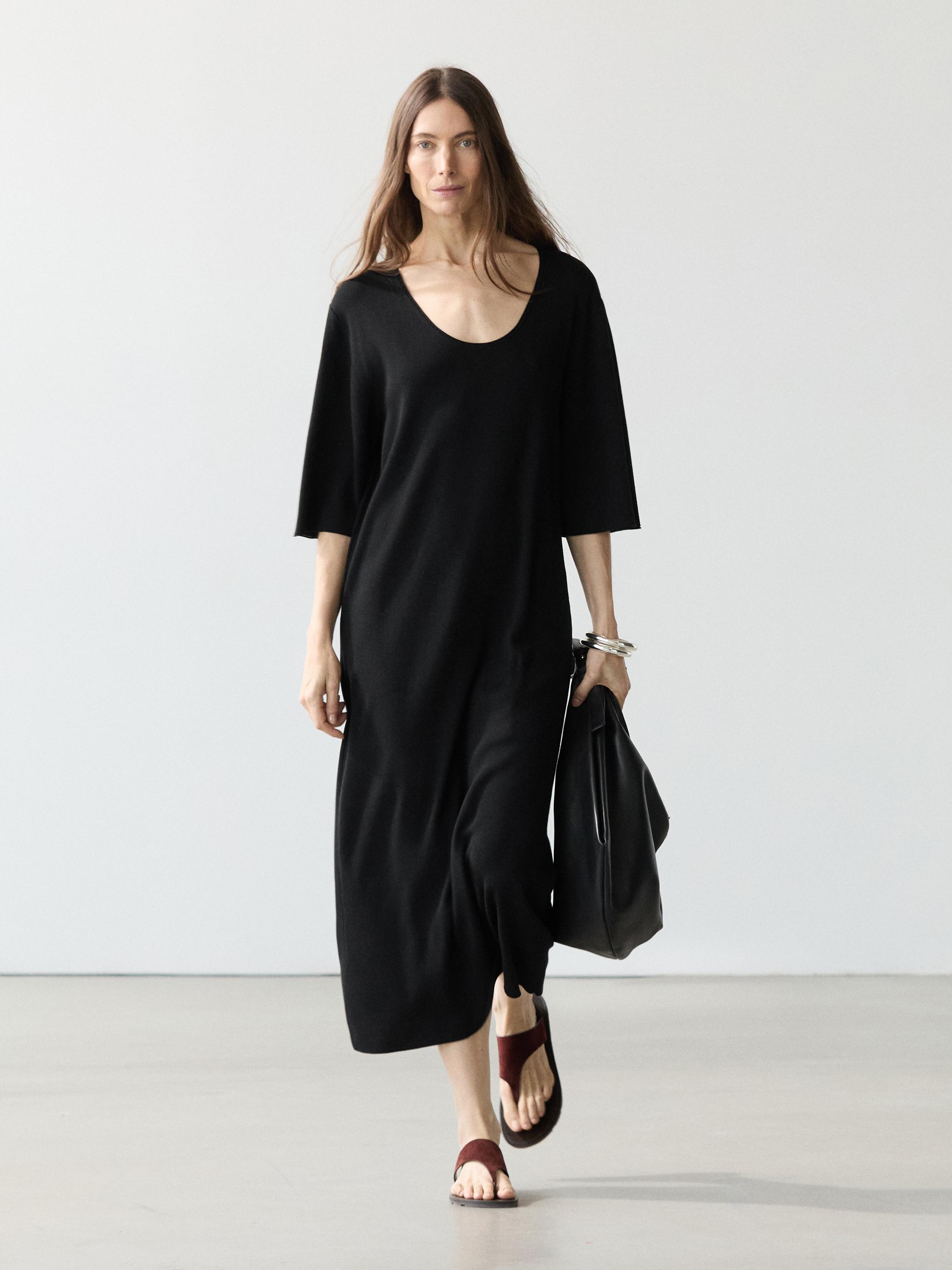 Vestido midi detalle mangas