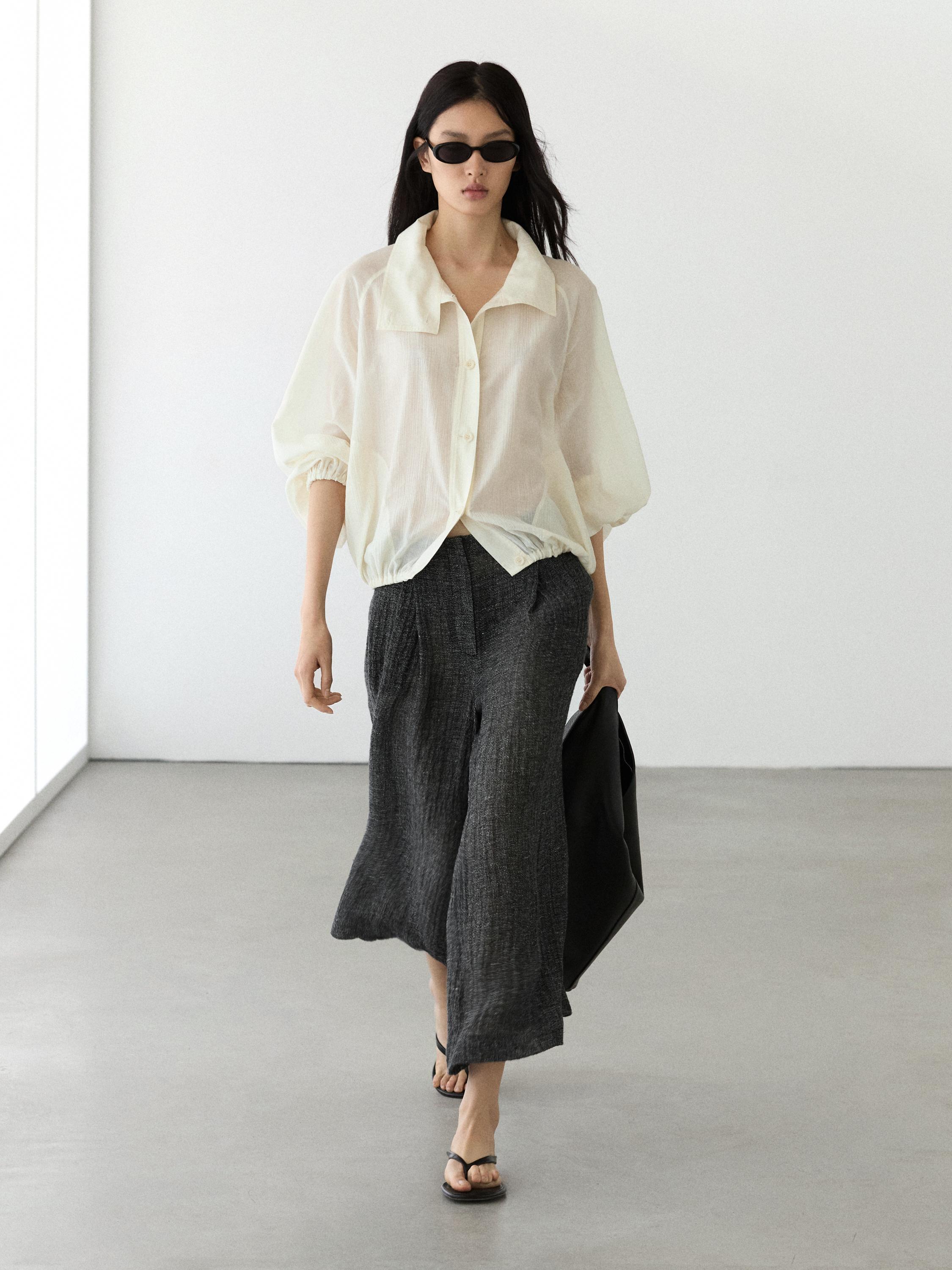 Pantalón pinzas total look melange lino