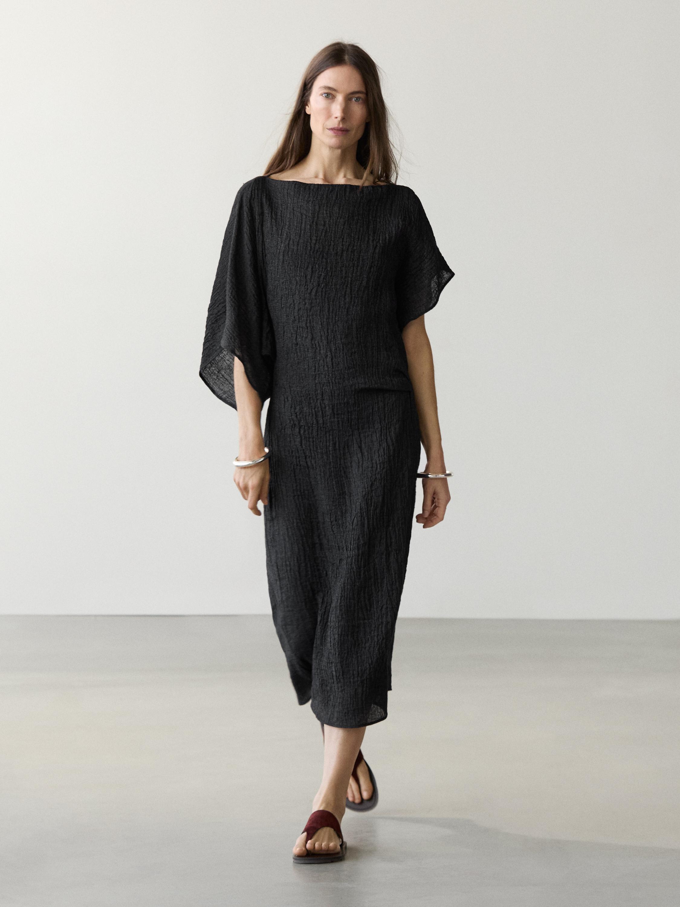 Vestido midi manga asimétrica lino