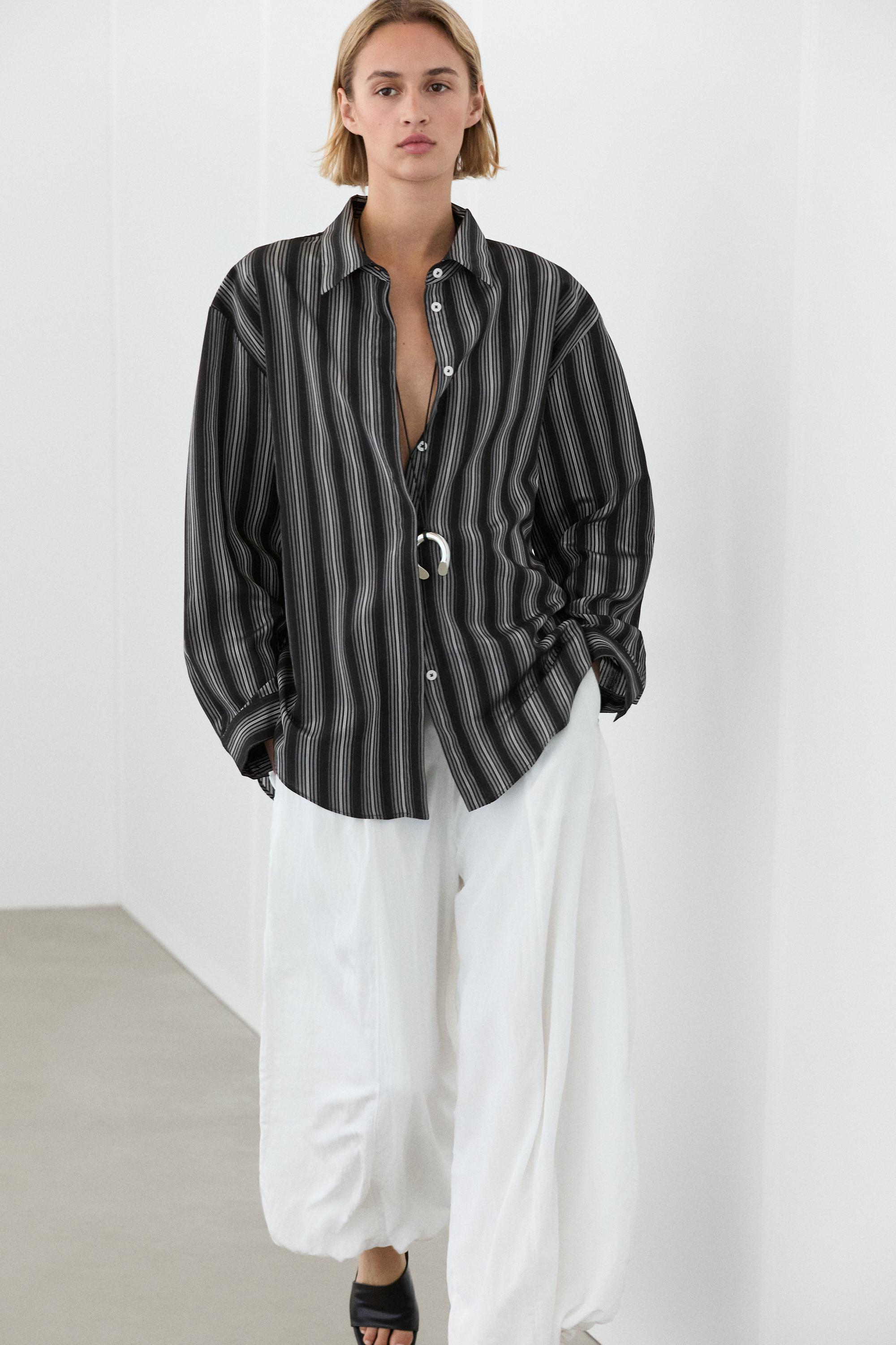 Camisa fluida detalle rayas