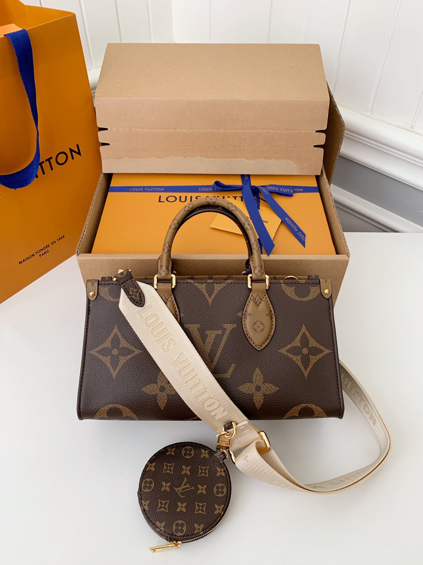 LV Onthego Eat-West  25*13*10cm