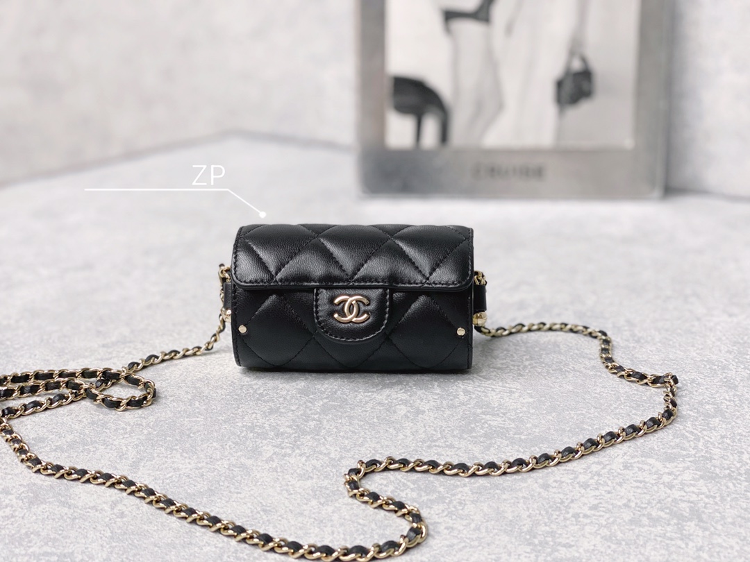 Chanel Quilted Barrel Clutch With Chain Gold Embossed Side Panels Black