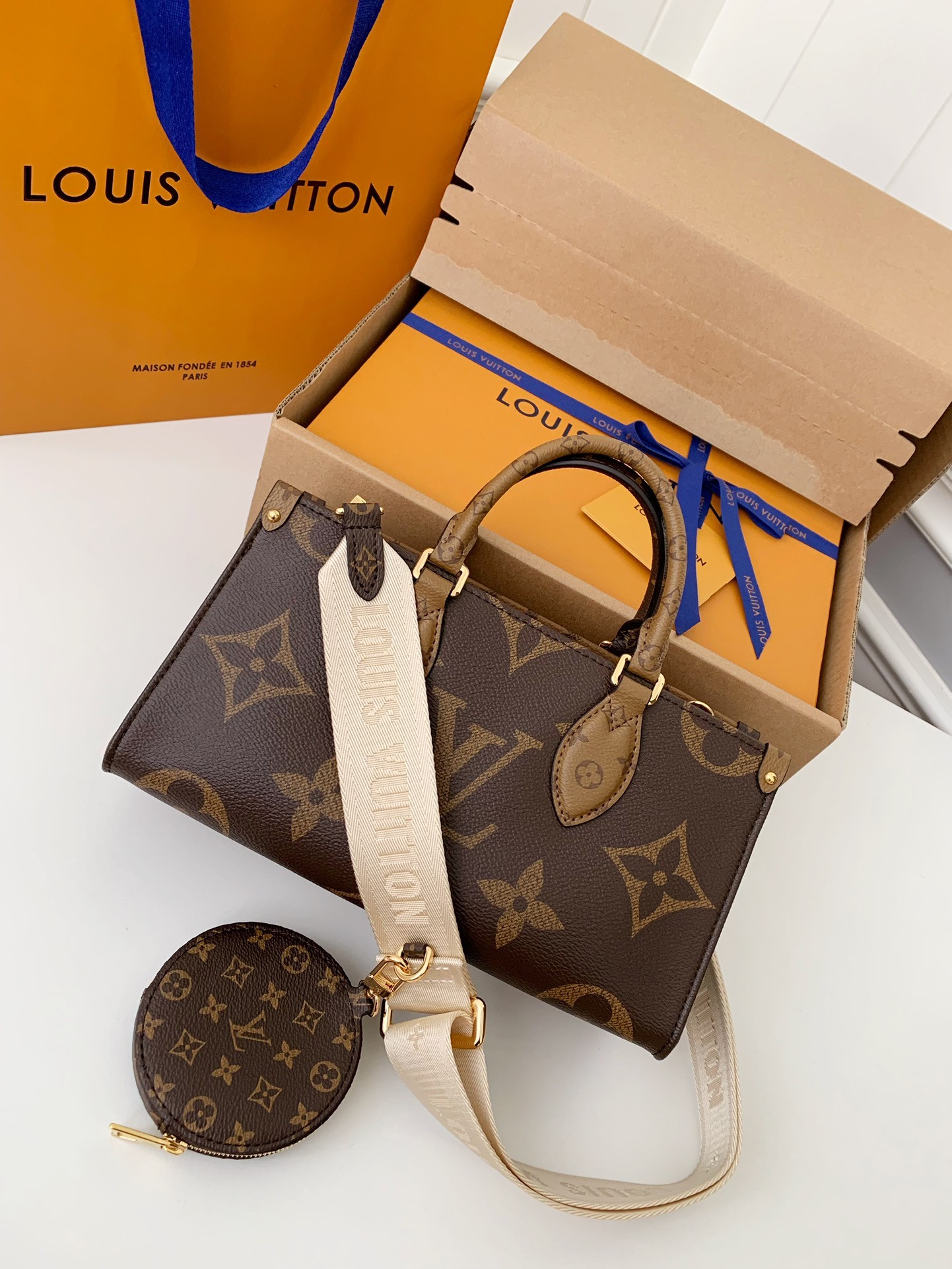 LV Onthego Eat-West  25*13*10cm