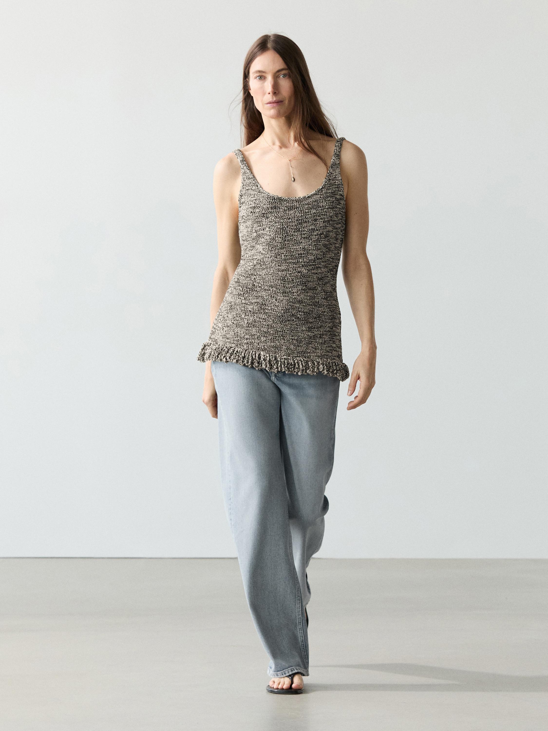 Top punto detalle flecos total look