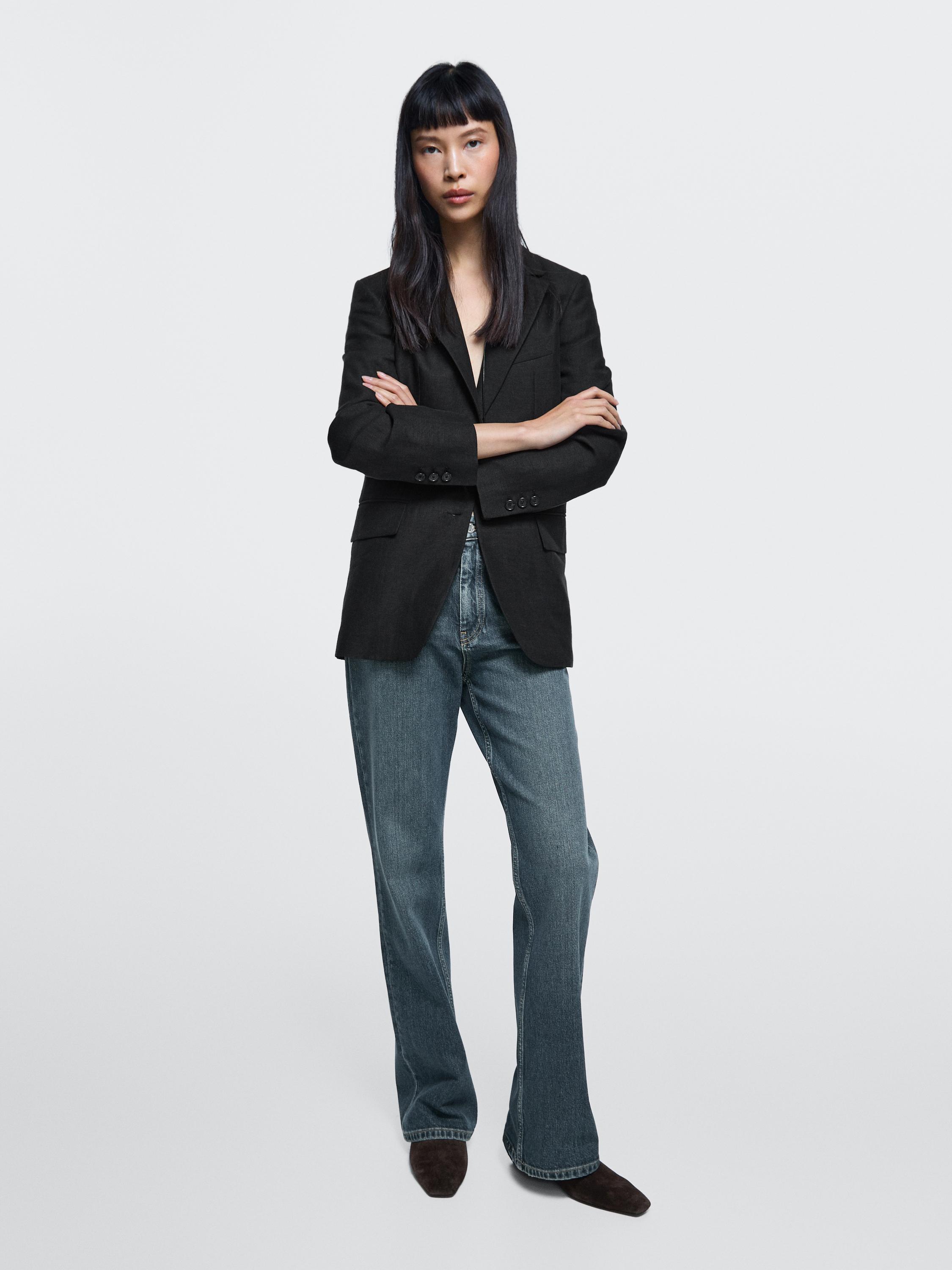 Jeans bootcut fit tiro alto