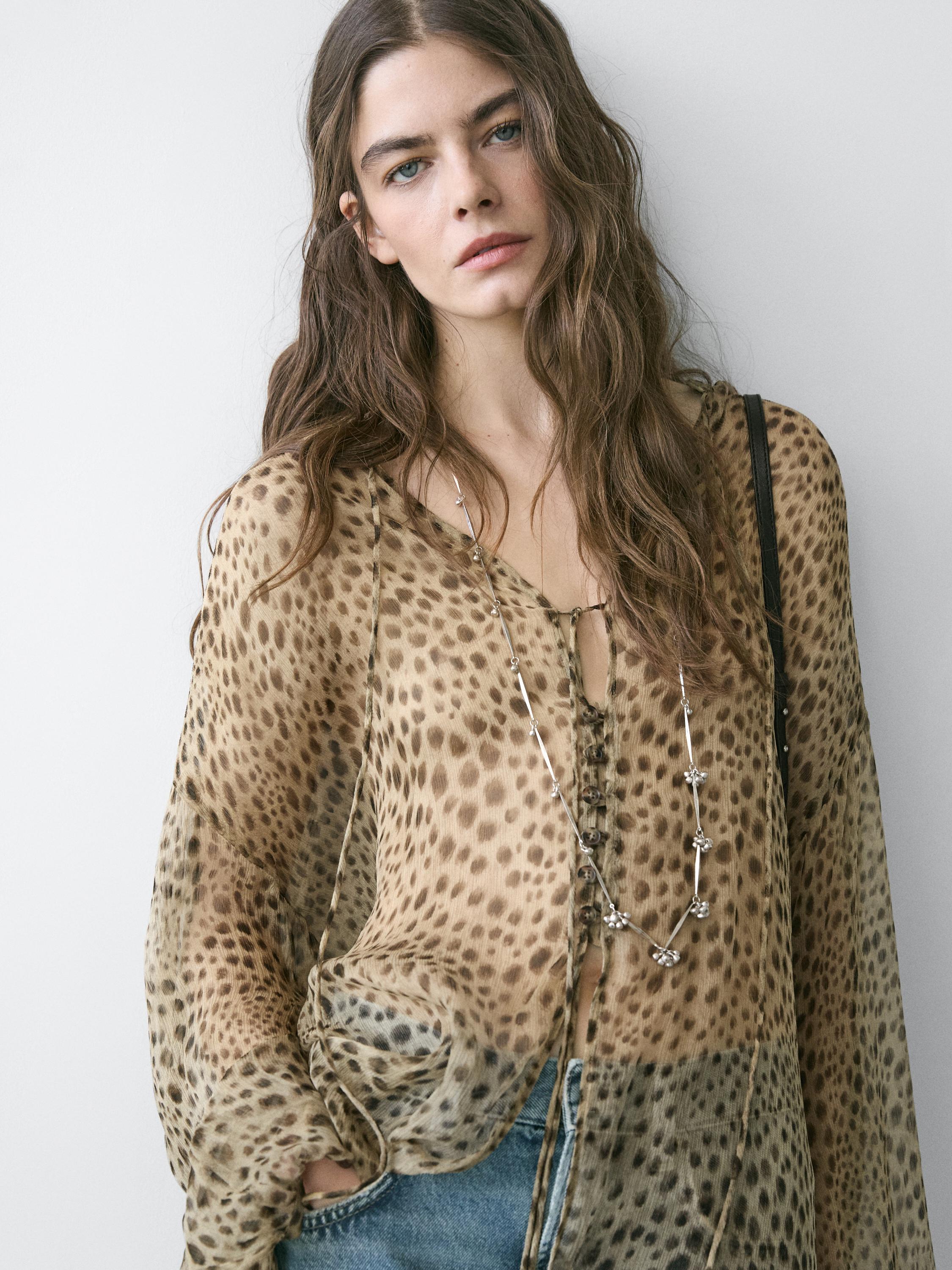 Blusa fluida animal print