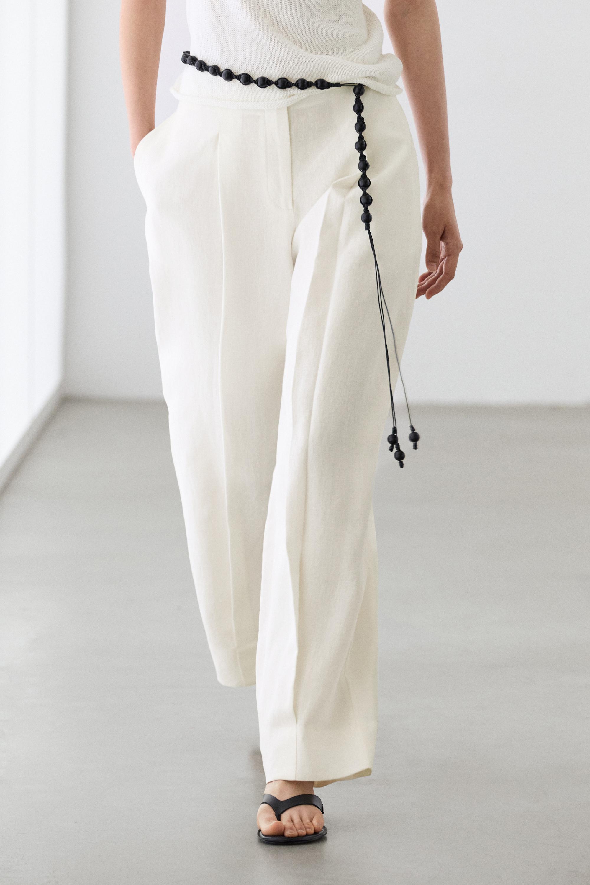 Pantalón detalle pinzas puño bajo lino