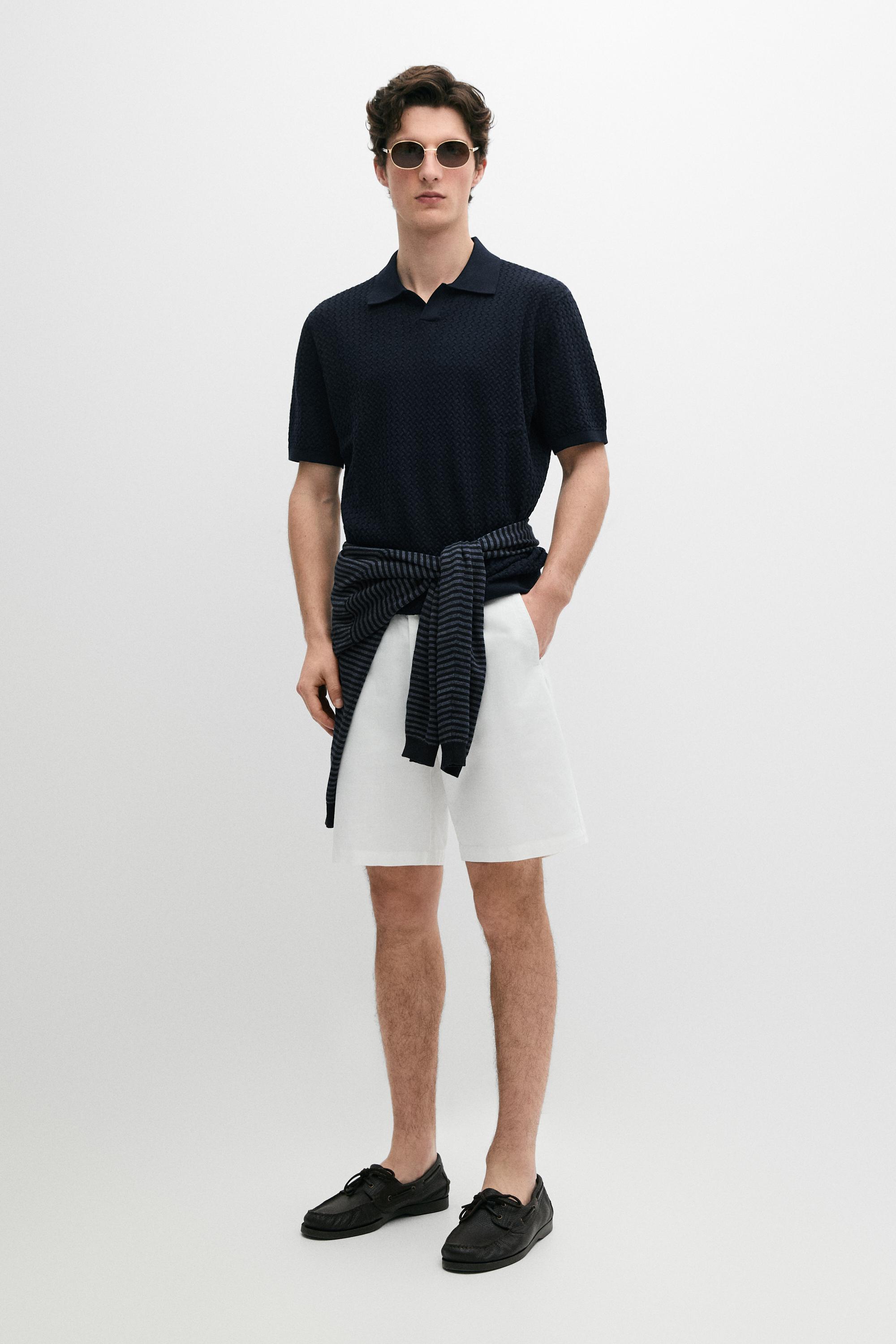 Polo cuello pico punto trenzado