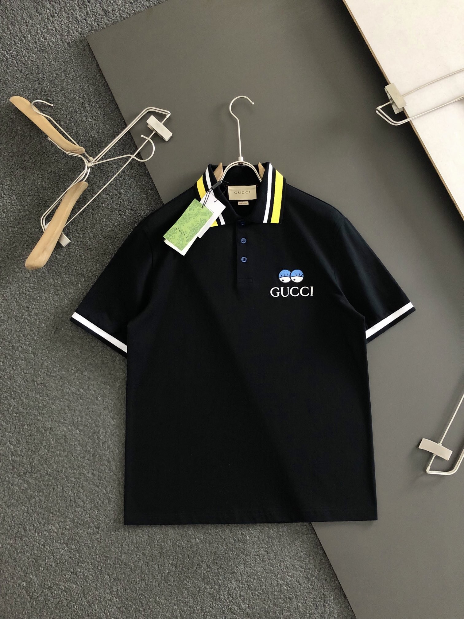 GUC Floral neckline embroidered polo shirt with cartoon lettering