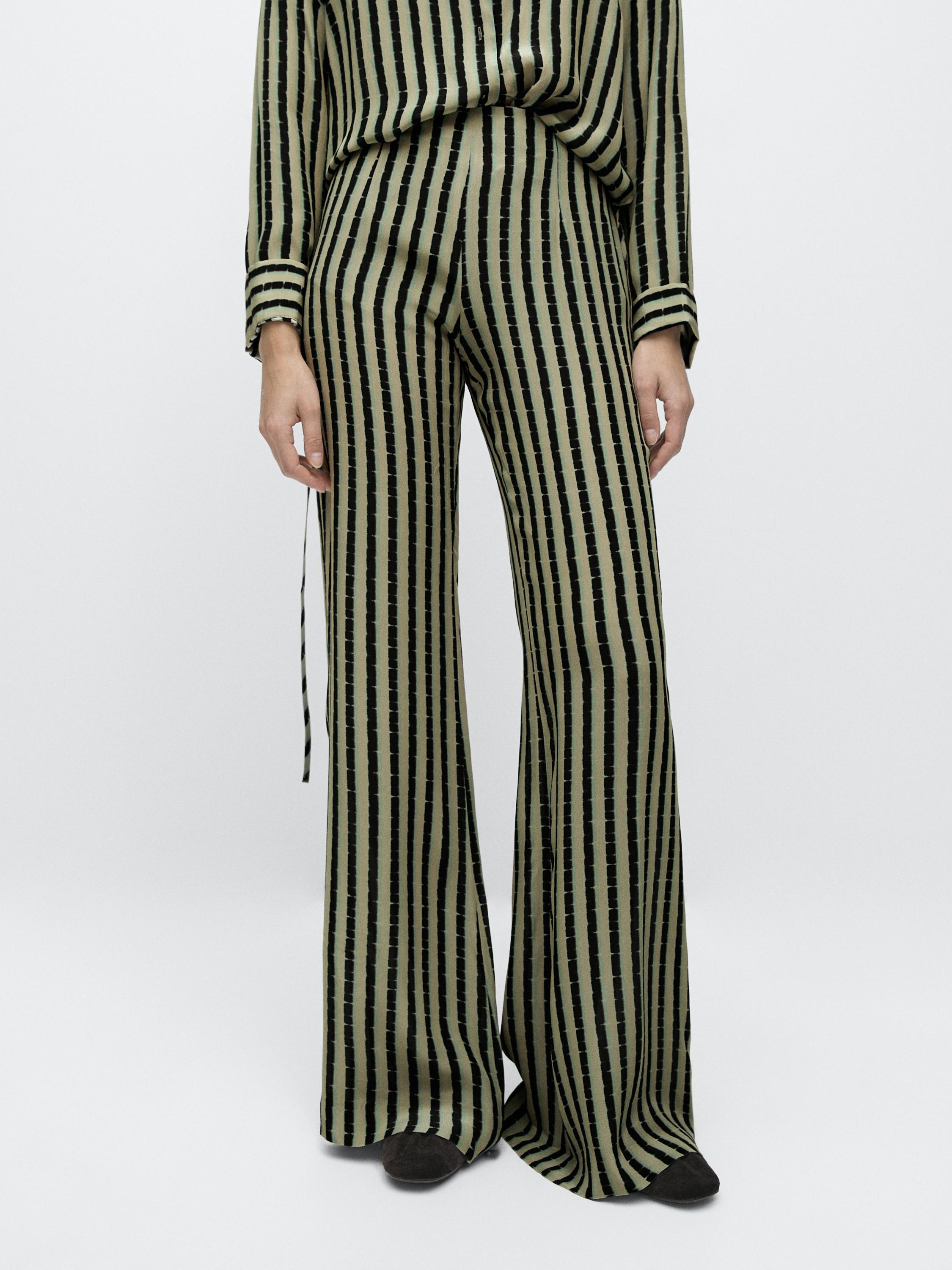 Pantalón rayas flare fit