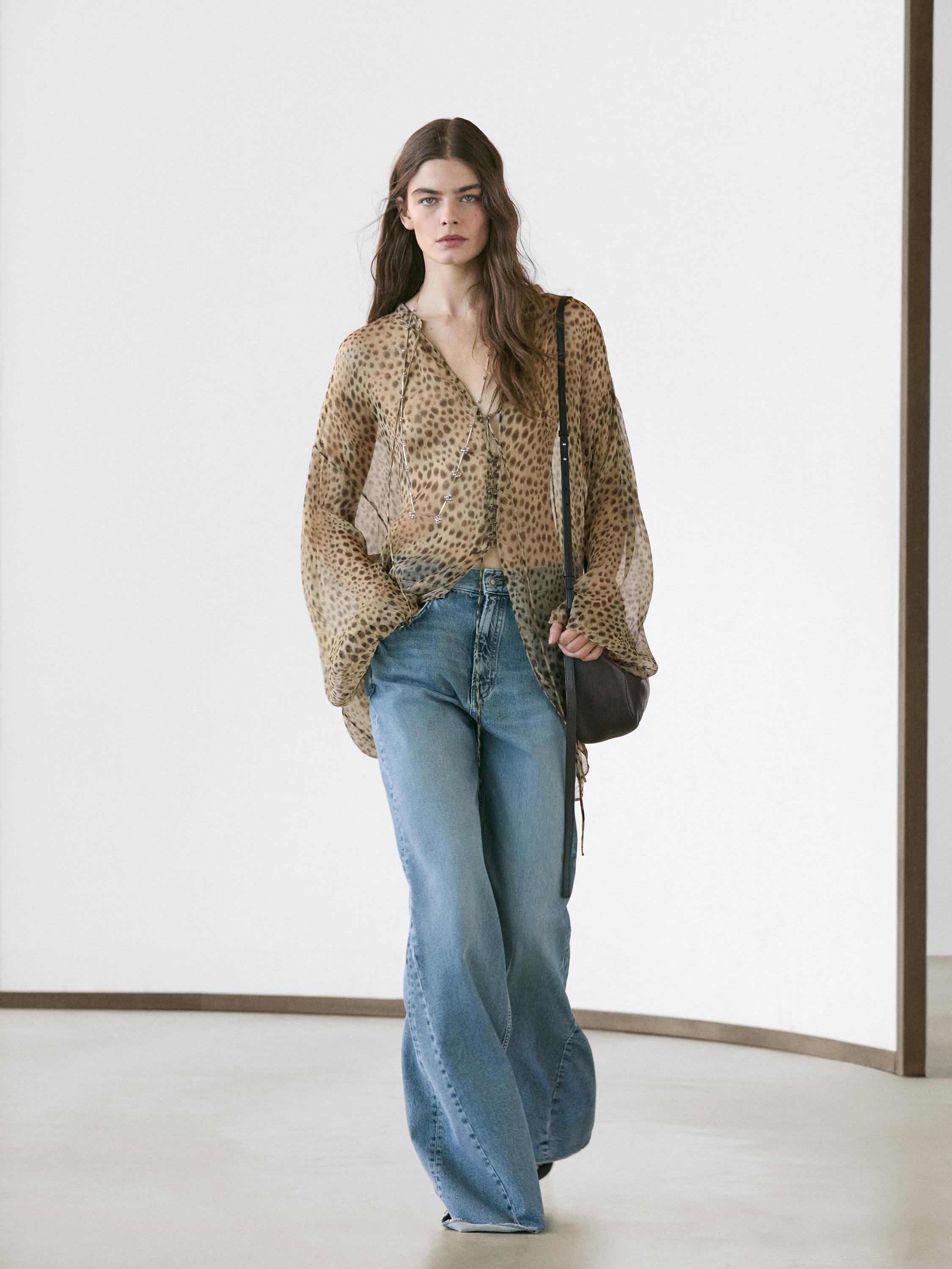Blusa fluida animal print