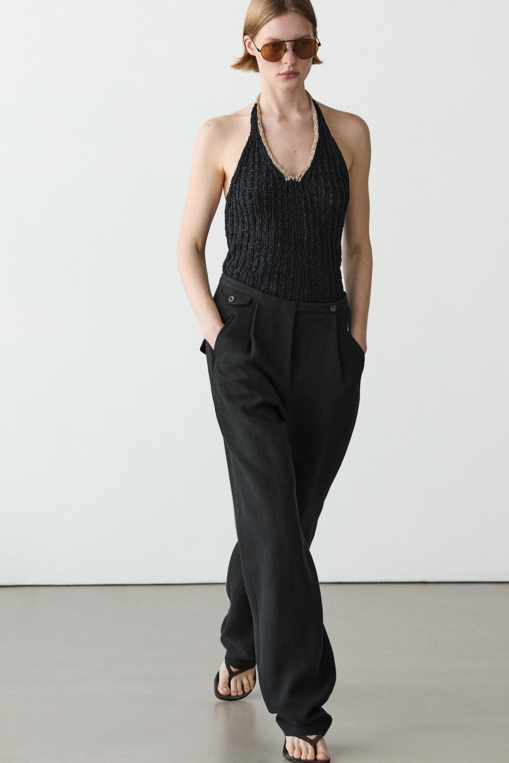 Pantalón fluido detalle bolsillos con lino