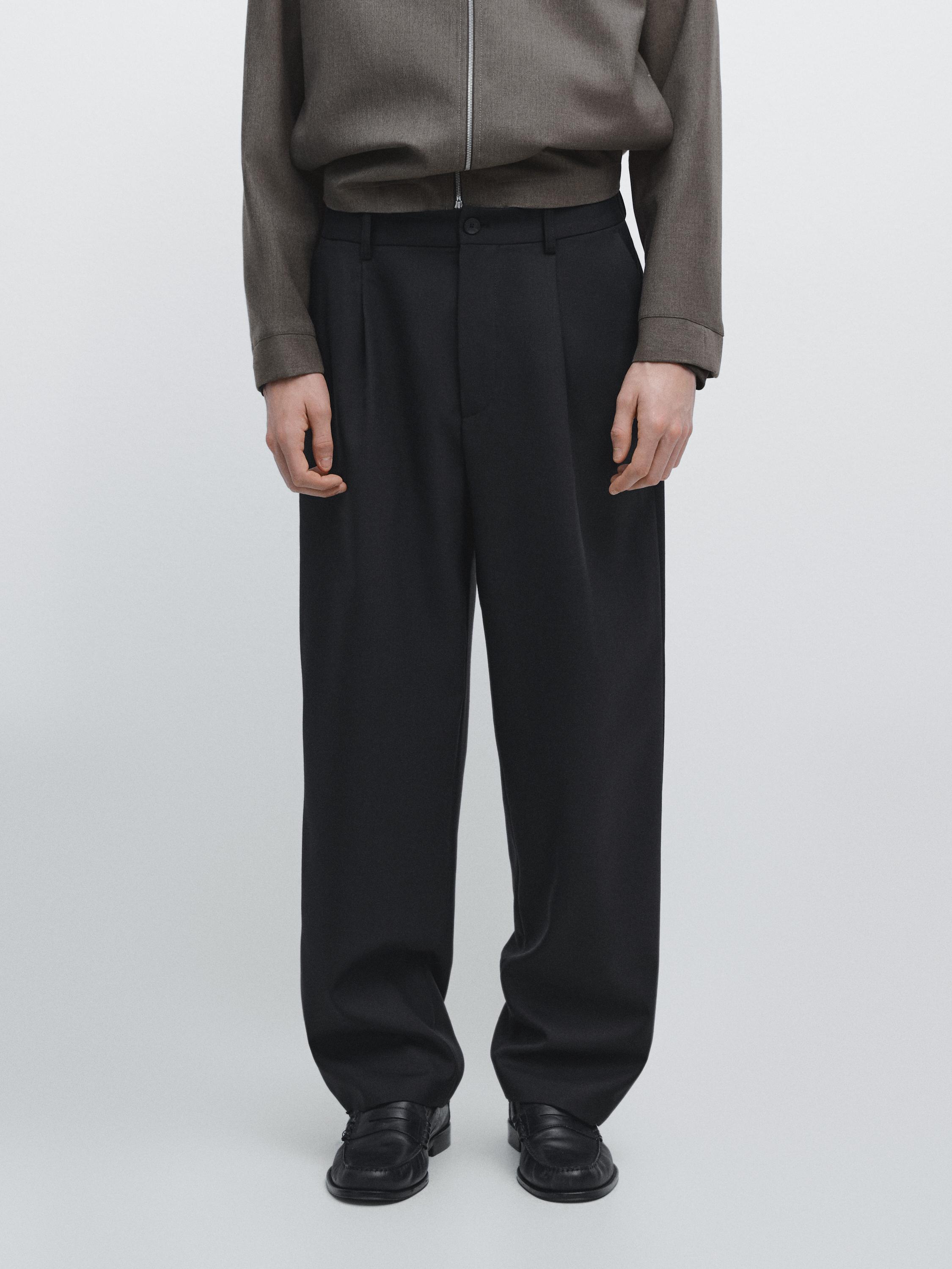 Pantalón relaxed fit detalle pinzas con lana