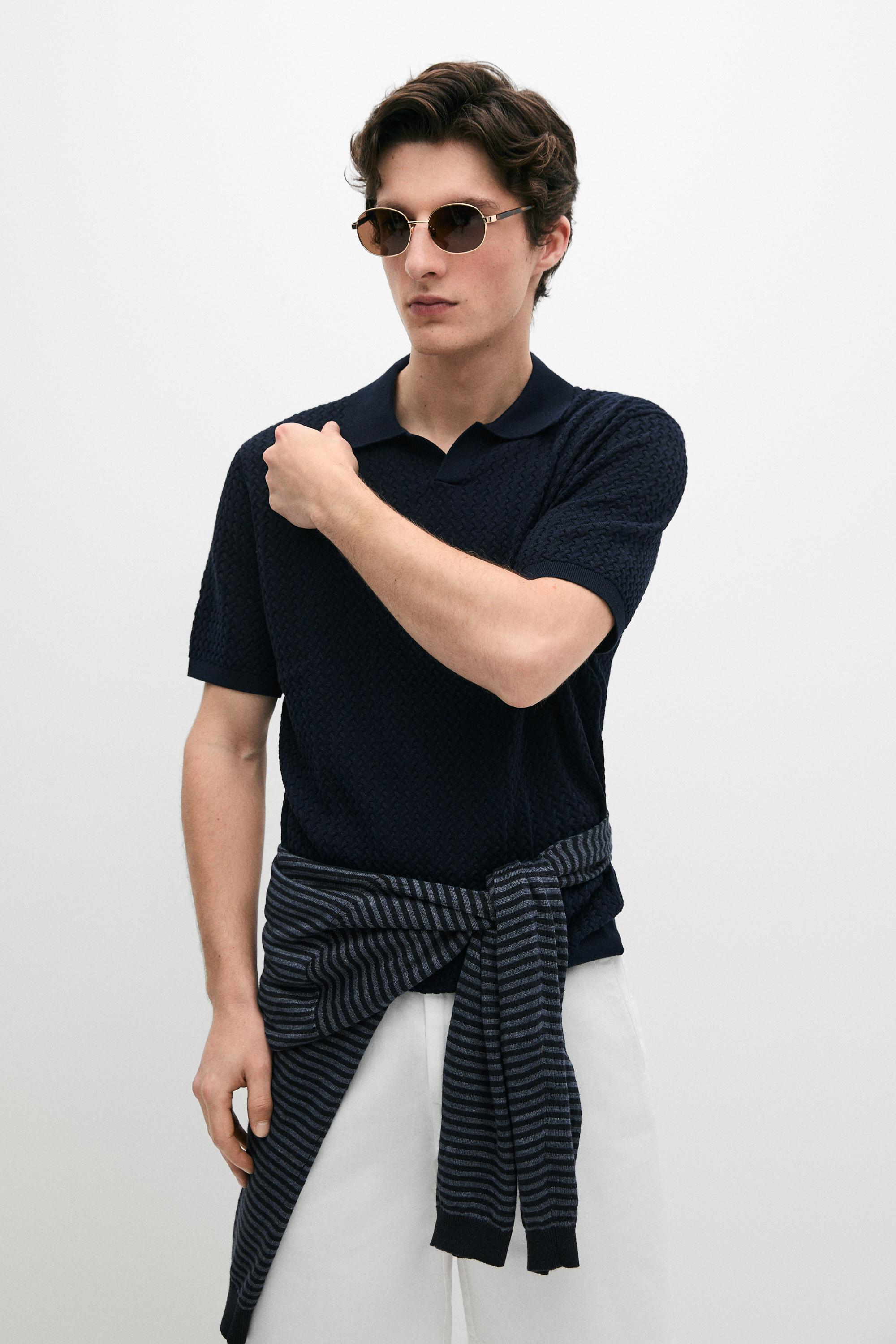 Polo cuello pico punto trenzado