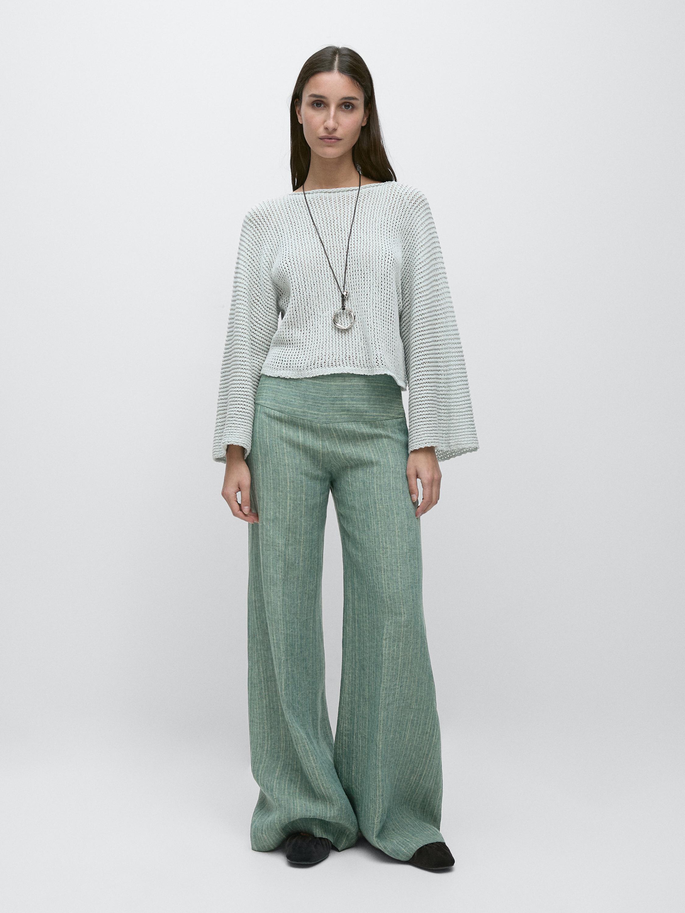 Pantalón fluido rayas detalle fajín