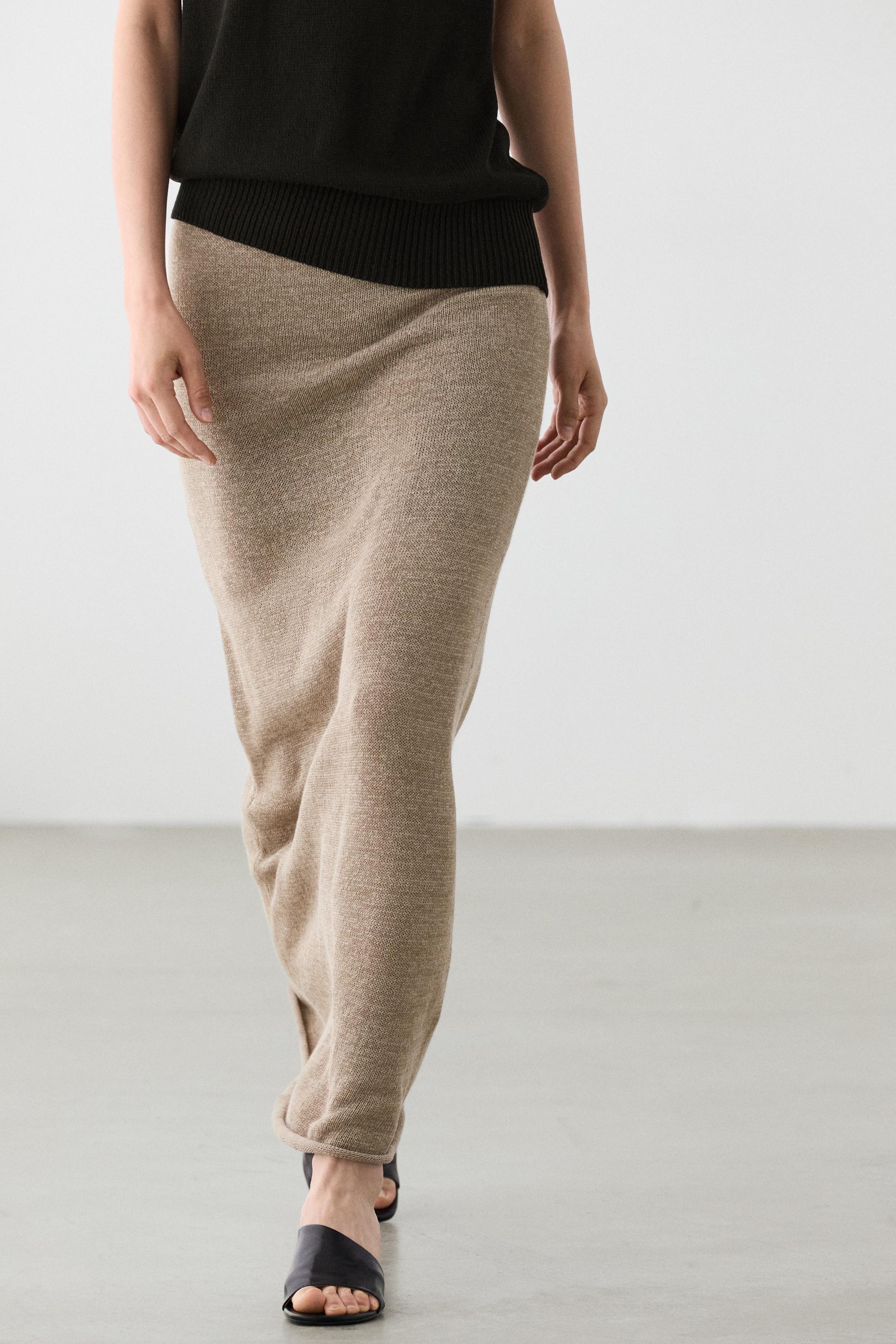 Falda punto evasé total look
