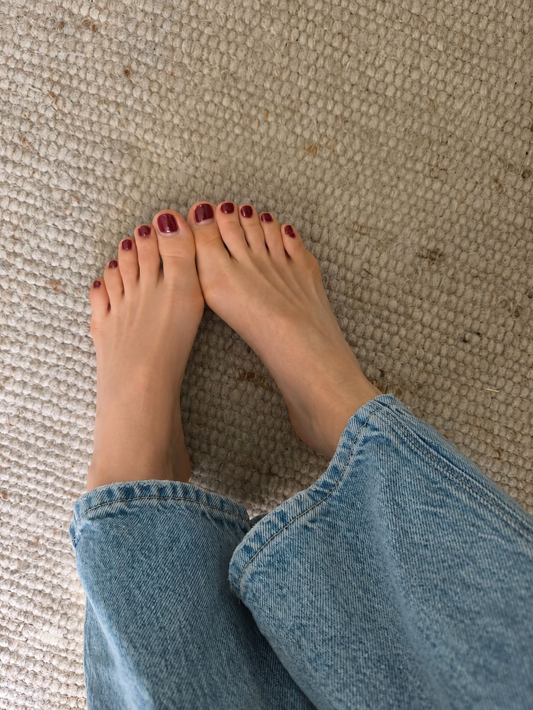 Cute little socks worn by a redheaded woman