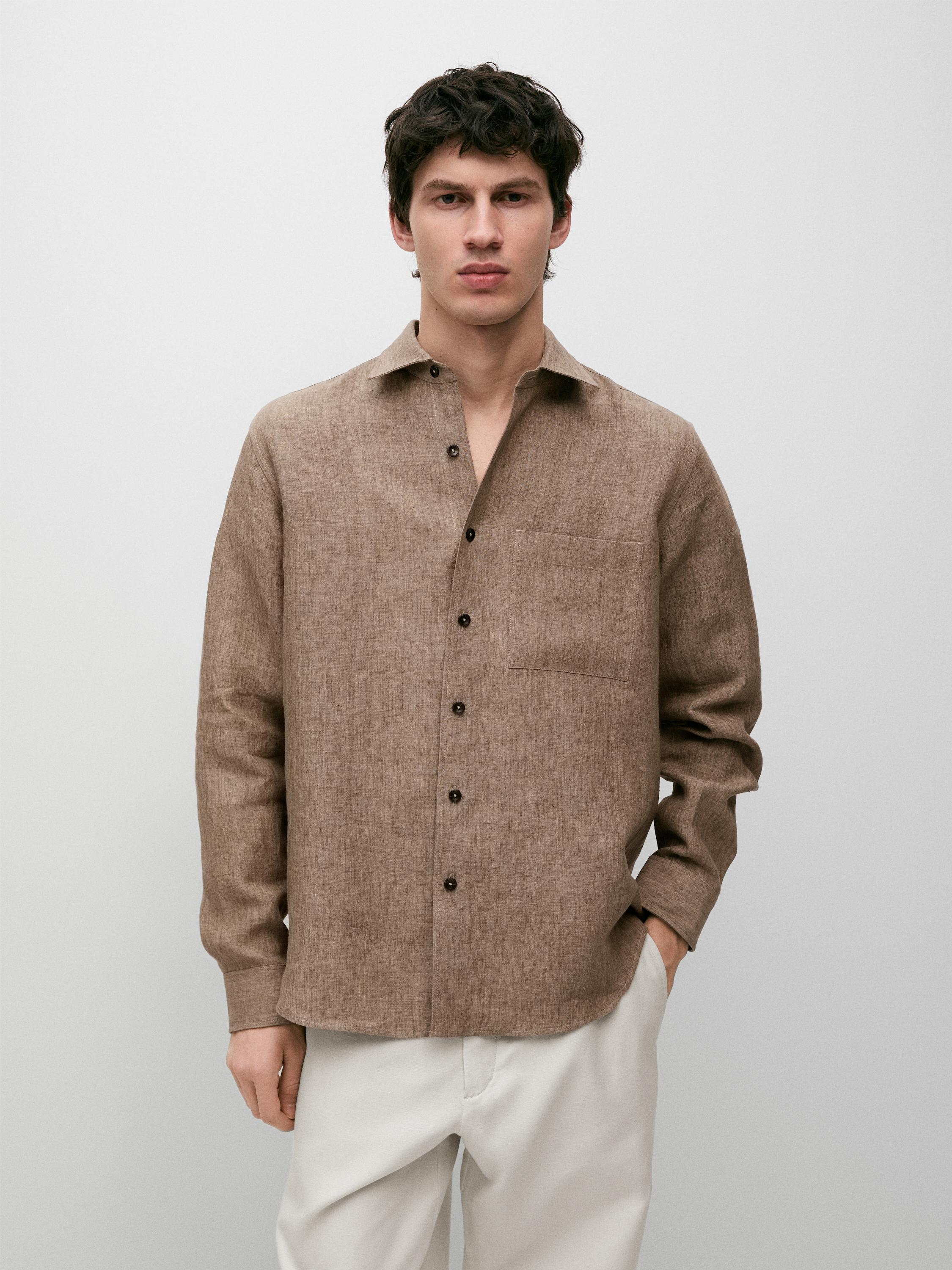 Camisa regular fit delavé detalle bolsillo lino