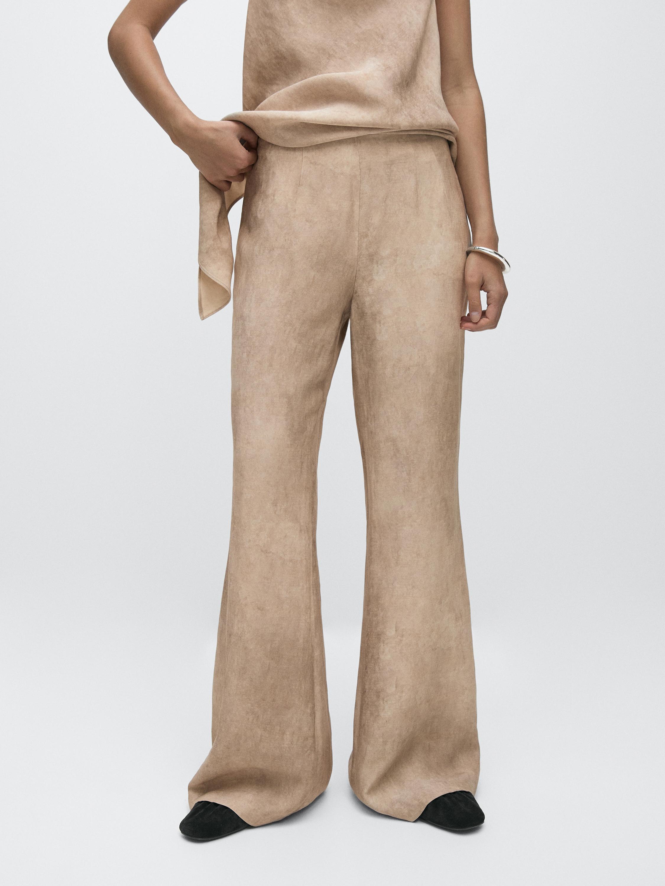 Pantalón fluido efecto desgastado
