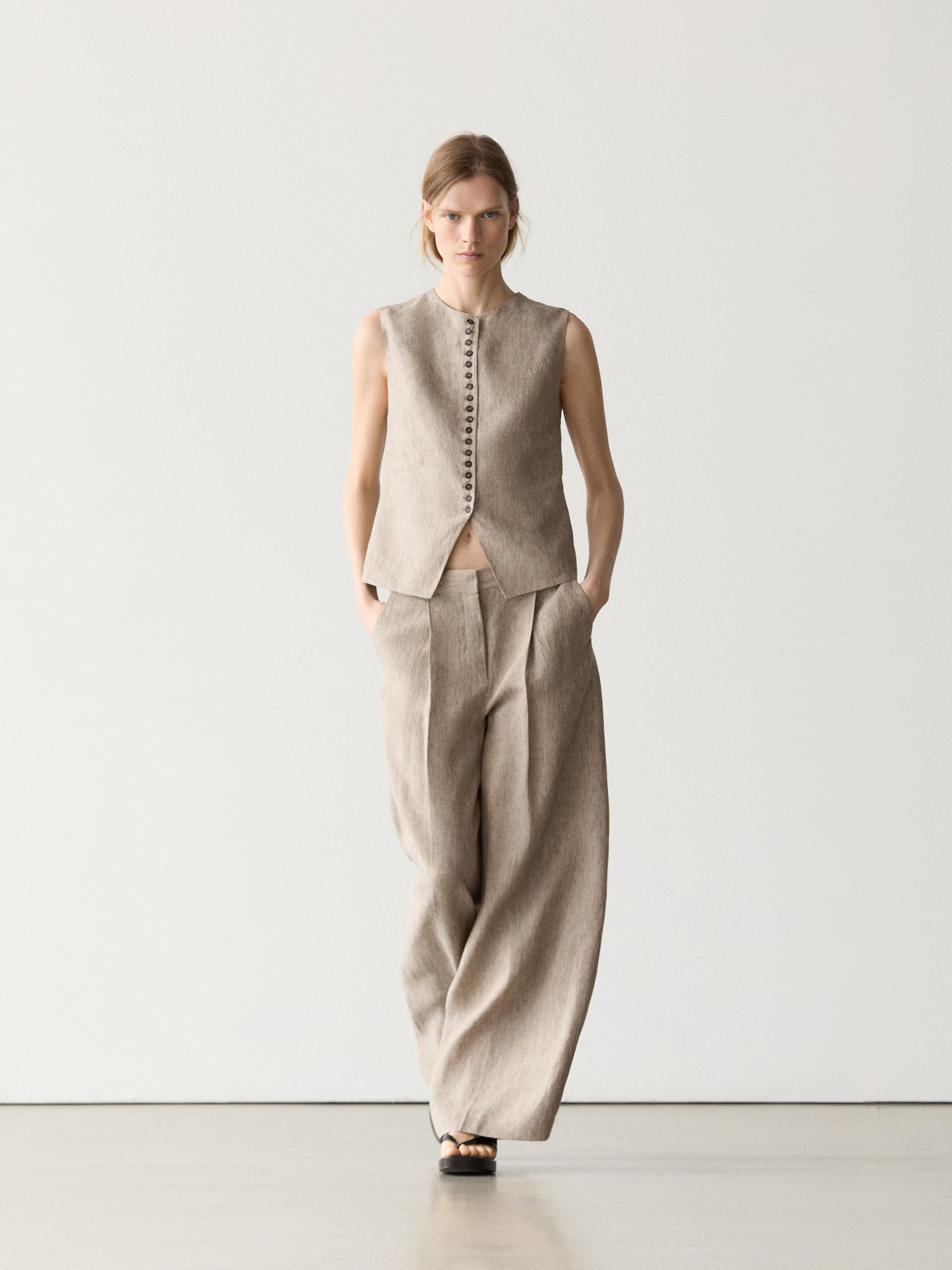 Pantalón melange detalle pliegues lino