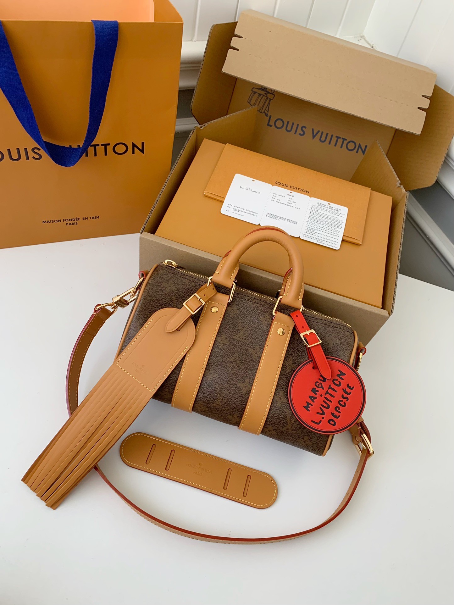 LV The New Keepall Bandouli ère 25 handbag  M11542  Size：25*15*11cm