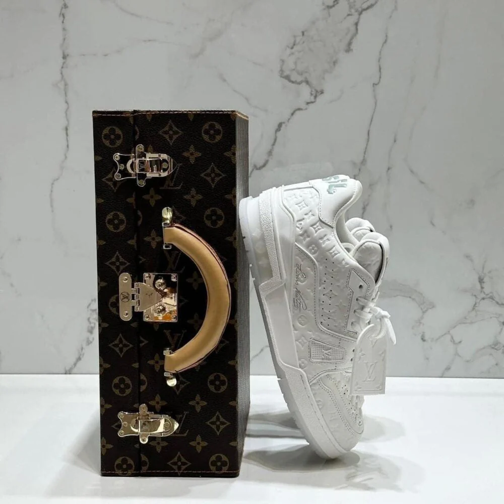 LV  Trainer Sneaker – Triple White Monogram Embossed Edition
