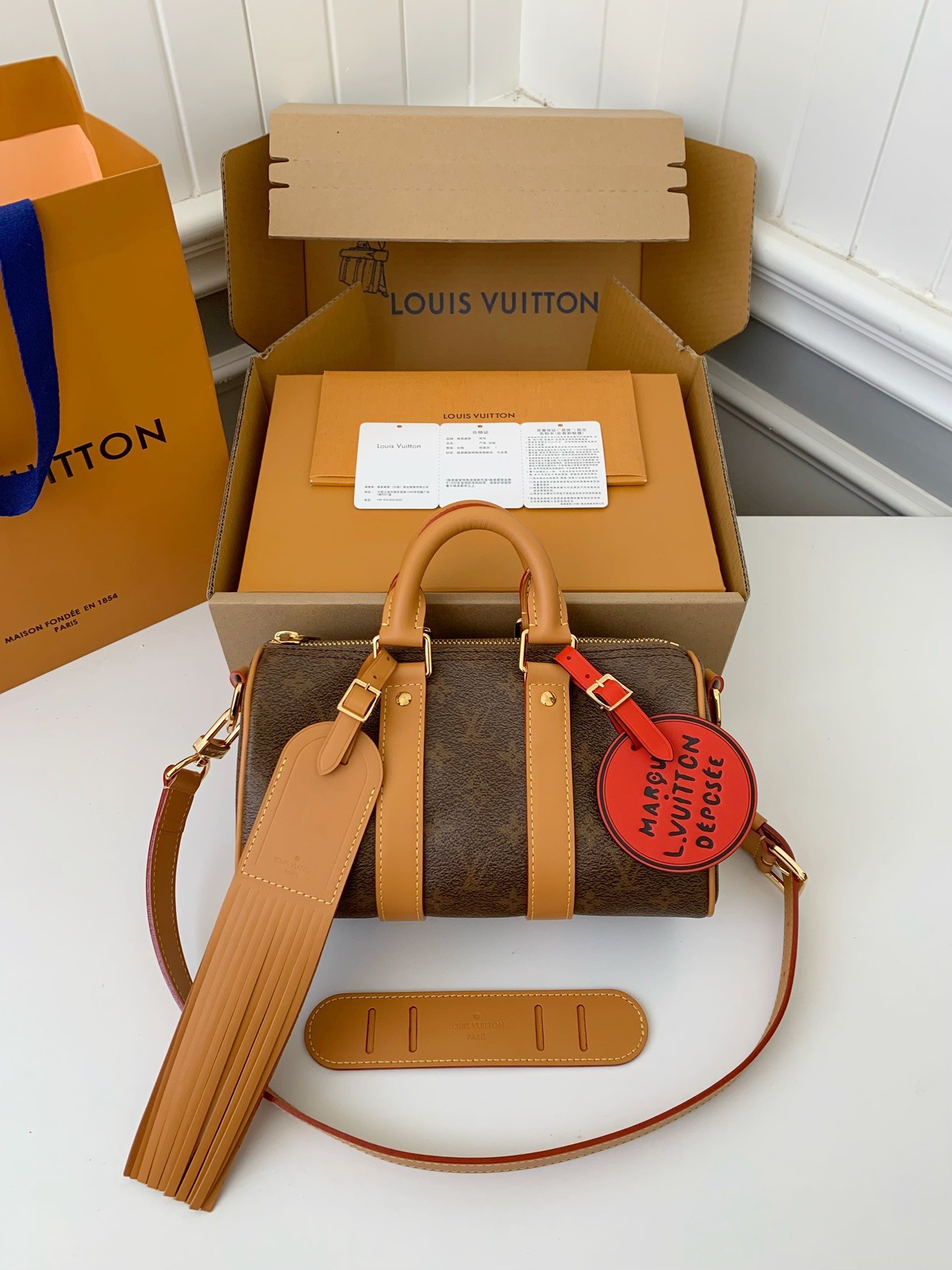 LV The New Keepall Bandouli ère 25 handbag  M11542  Size：25*15*11cm