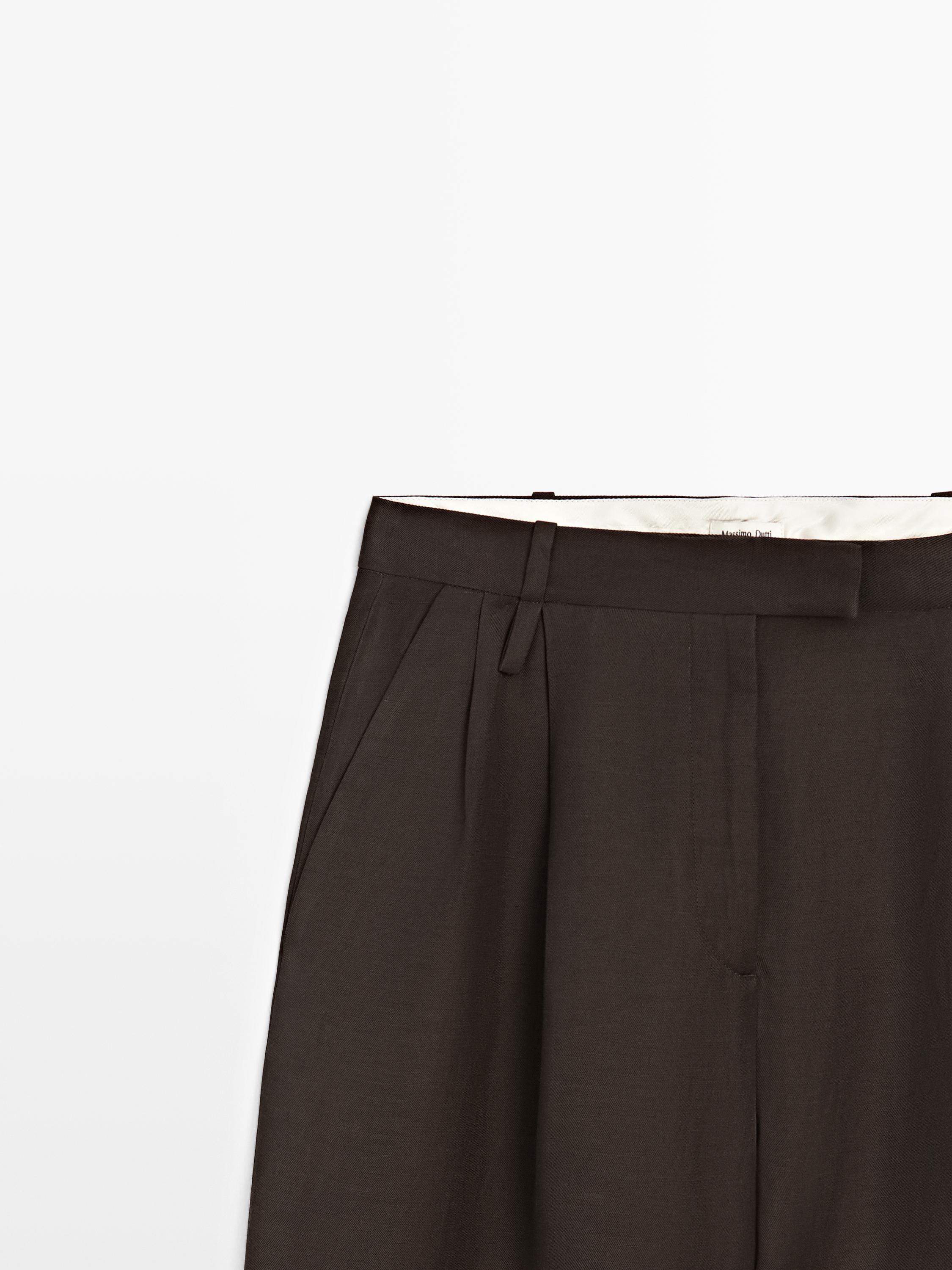 Pantalón pinzas detalle trabillas - STUDIO