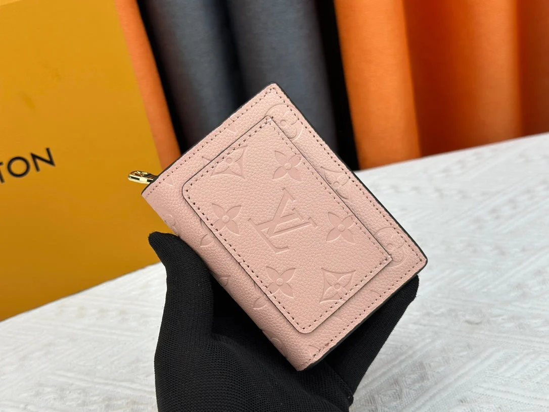 [Louis Vuitton] Embossed Leather Wallet: Small yet offers excellent storage capacity.