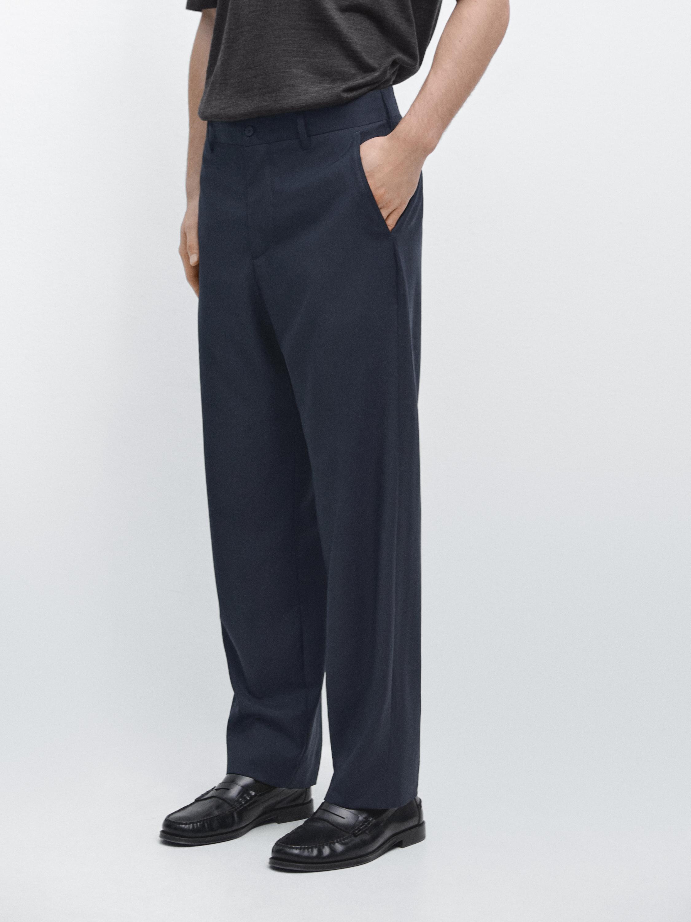 Pantalón traje wide leg lana fría