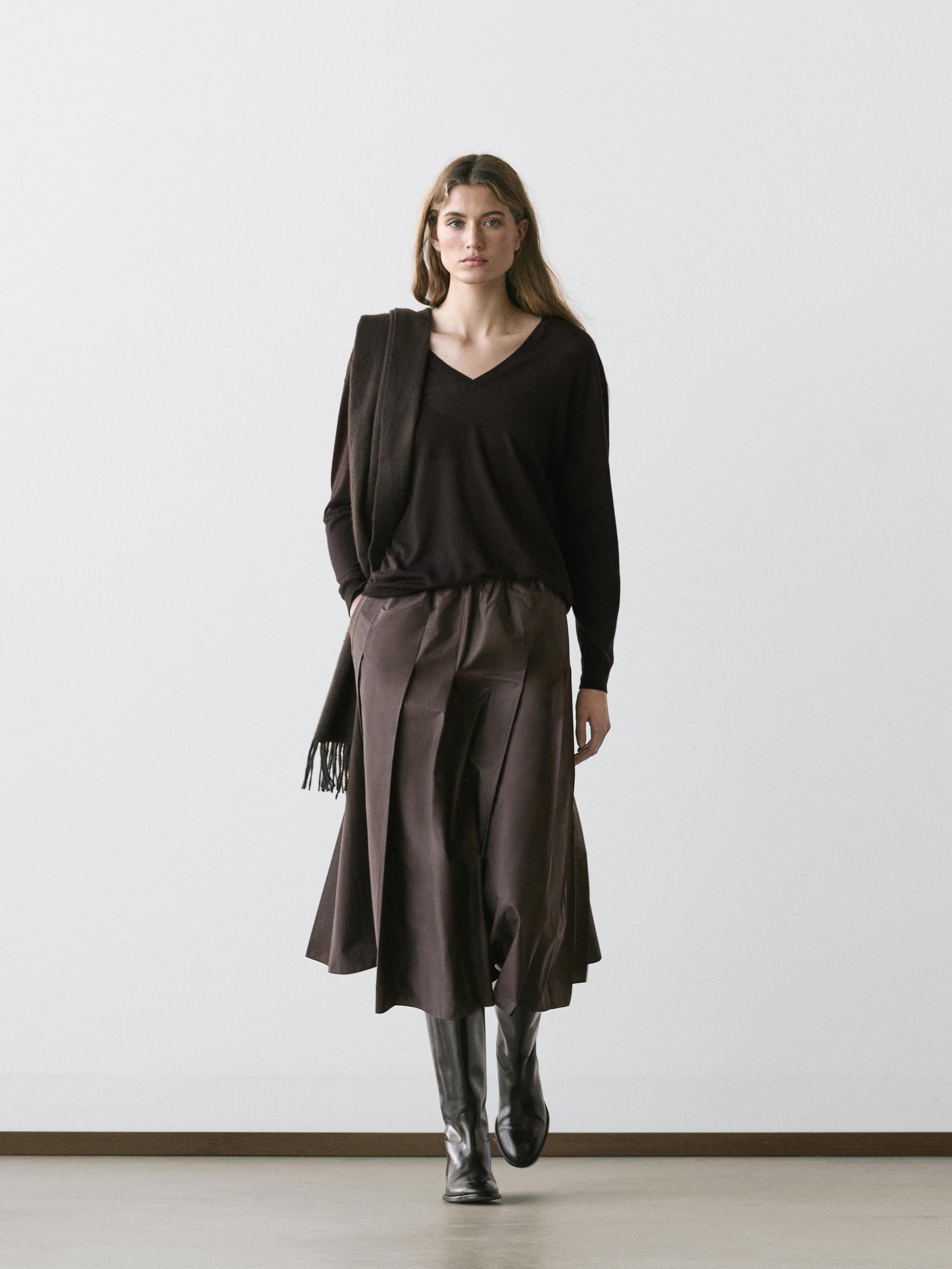 Falda midi tablas tejido técnico