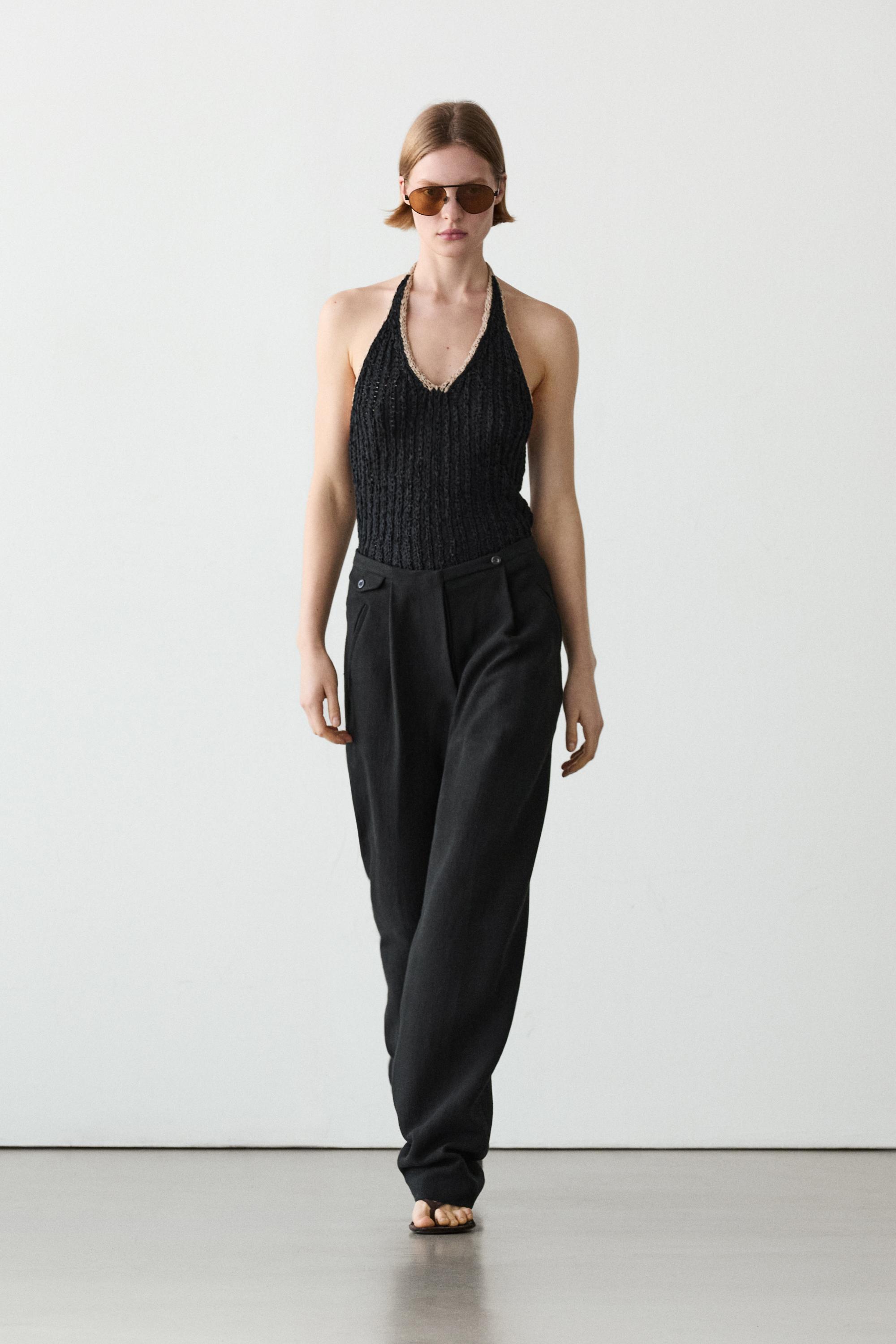Pantalón fluido detalle bolsillos con lino