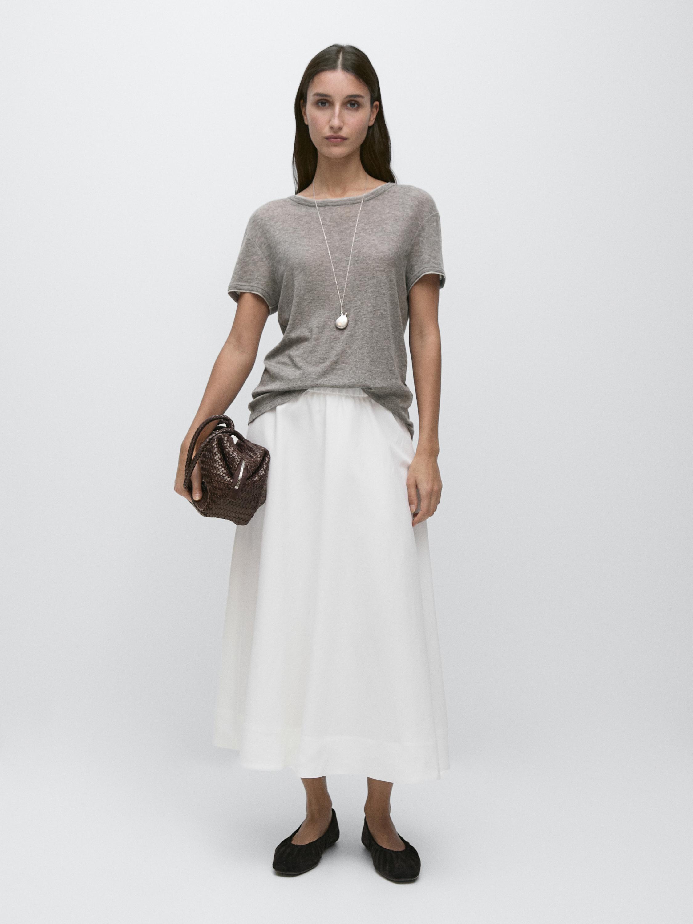 Falda midi fluida detalle goma