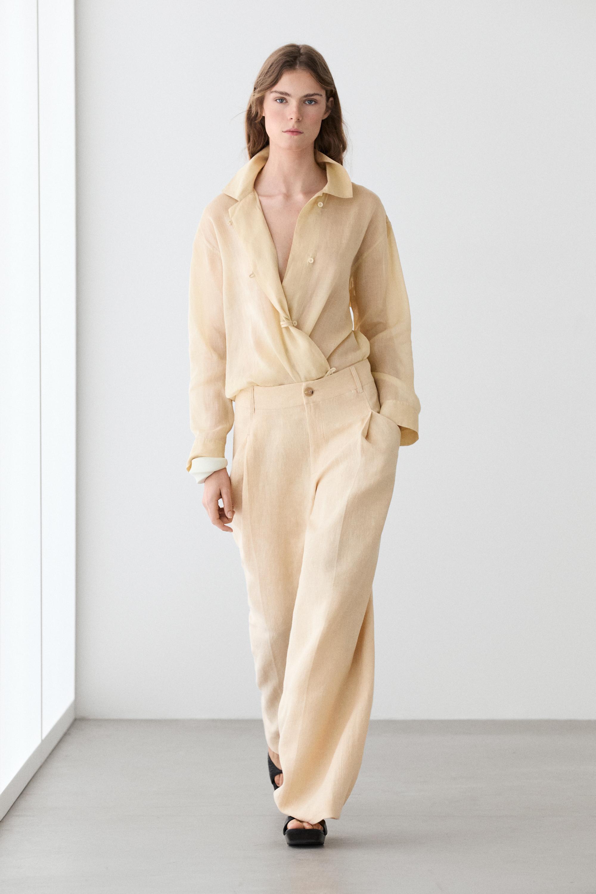 Pantalón wide leg detalle bolsillos lino