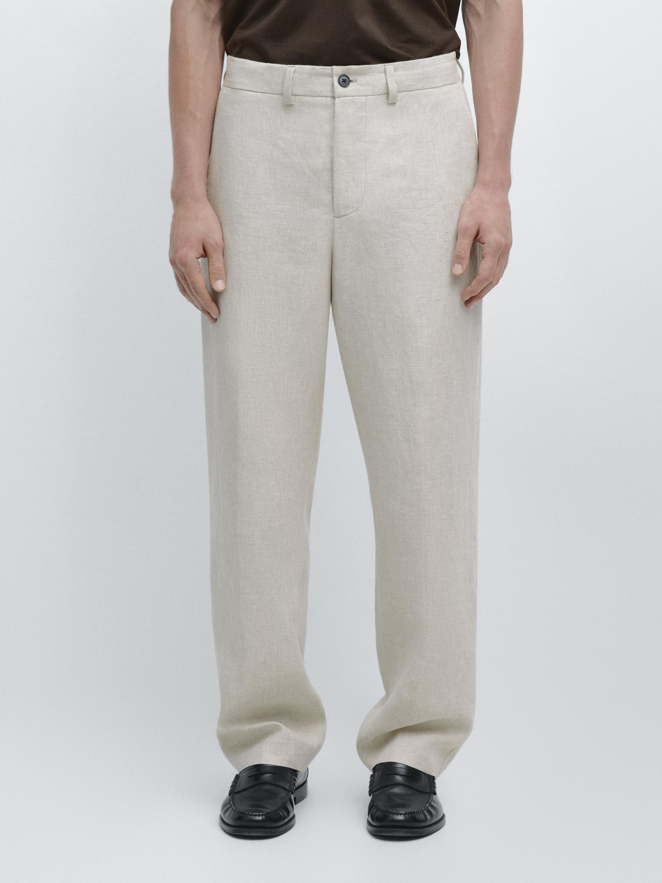 Pantalón ligero detalle espiga lino
