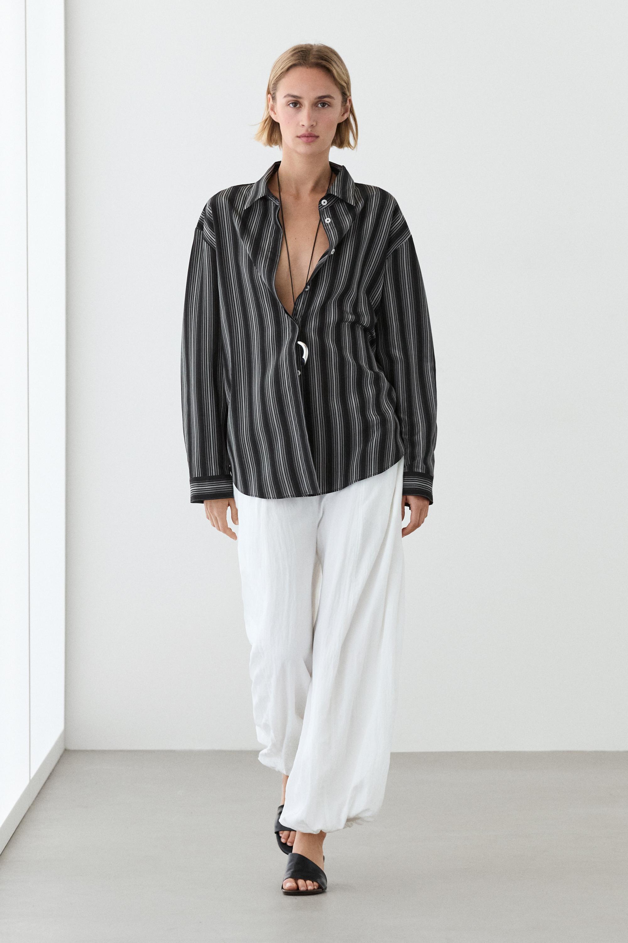 Camisa fluida detalle rayas
