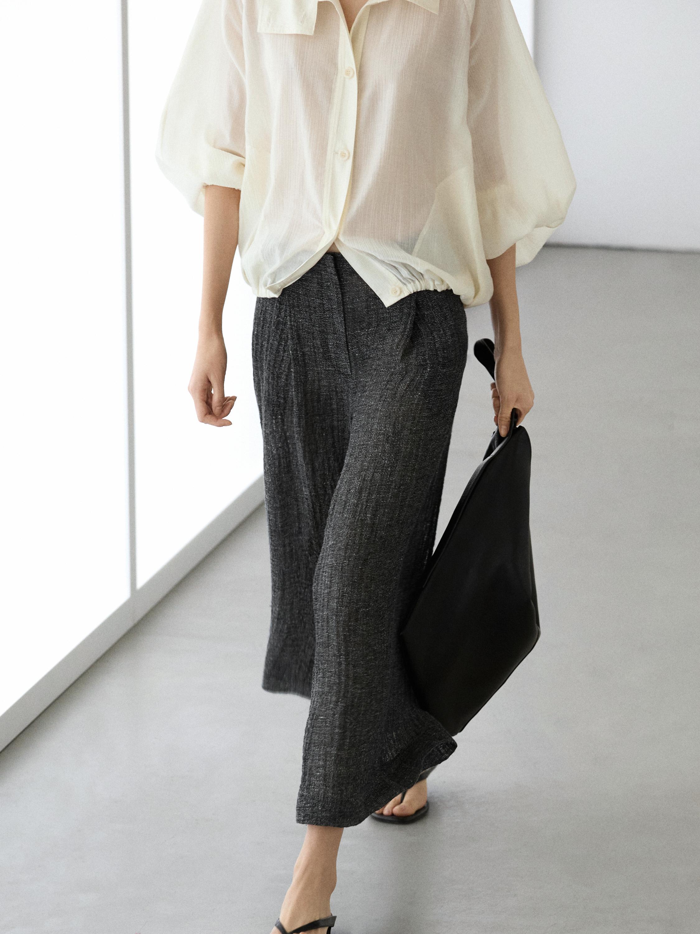 Pantalón pinzas total look melange lino