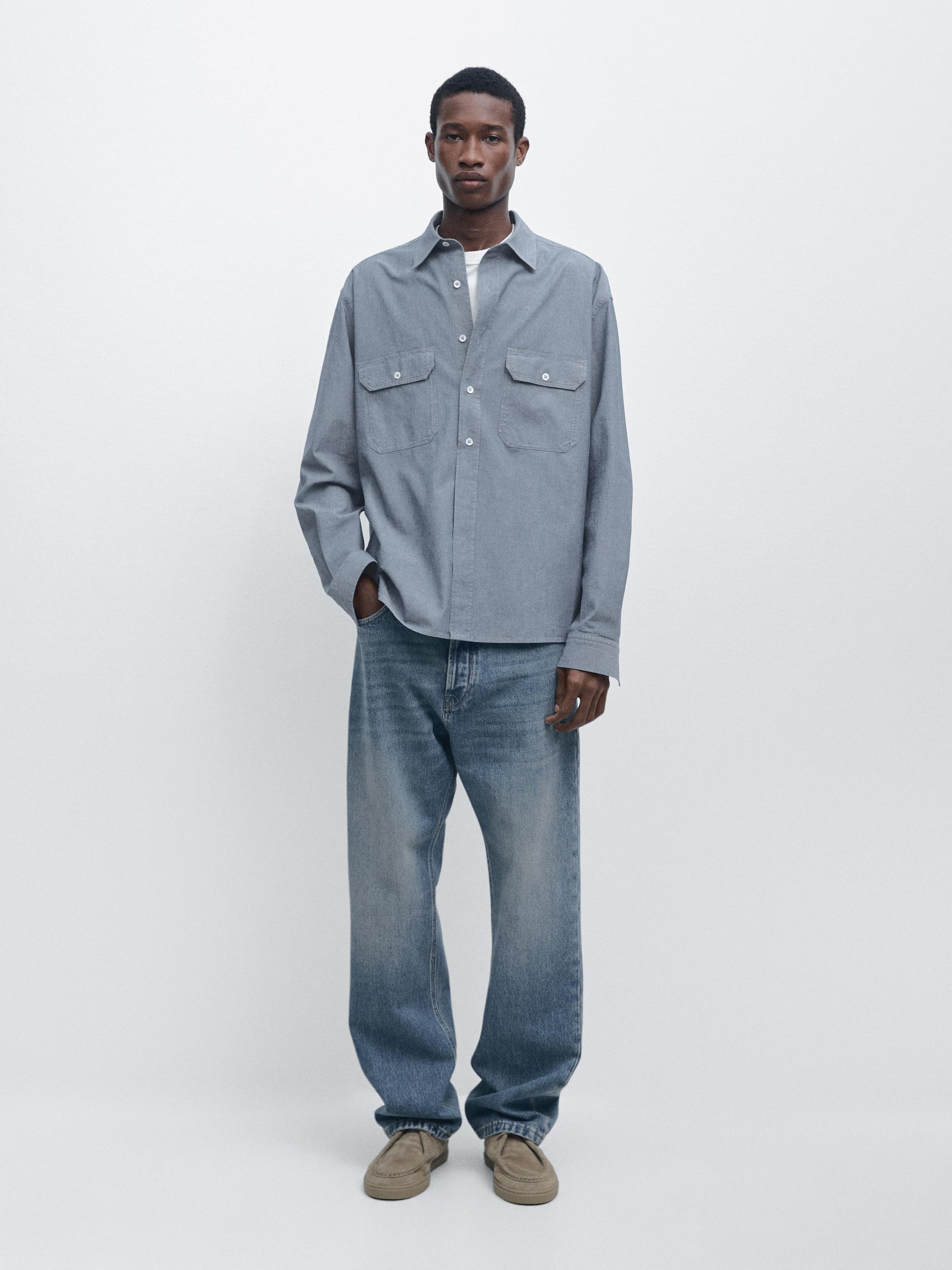 Camisa chambray regular fit detalle bolsillos