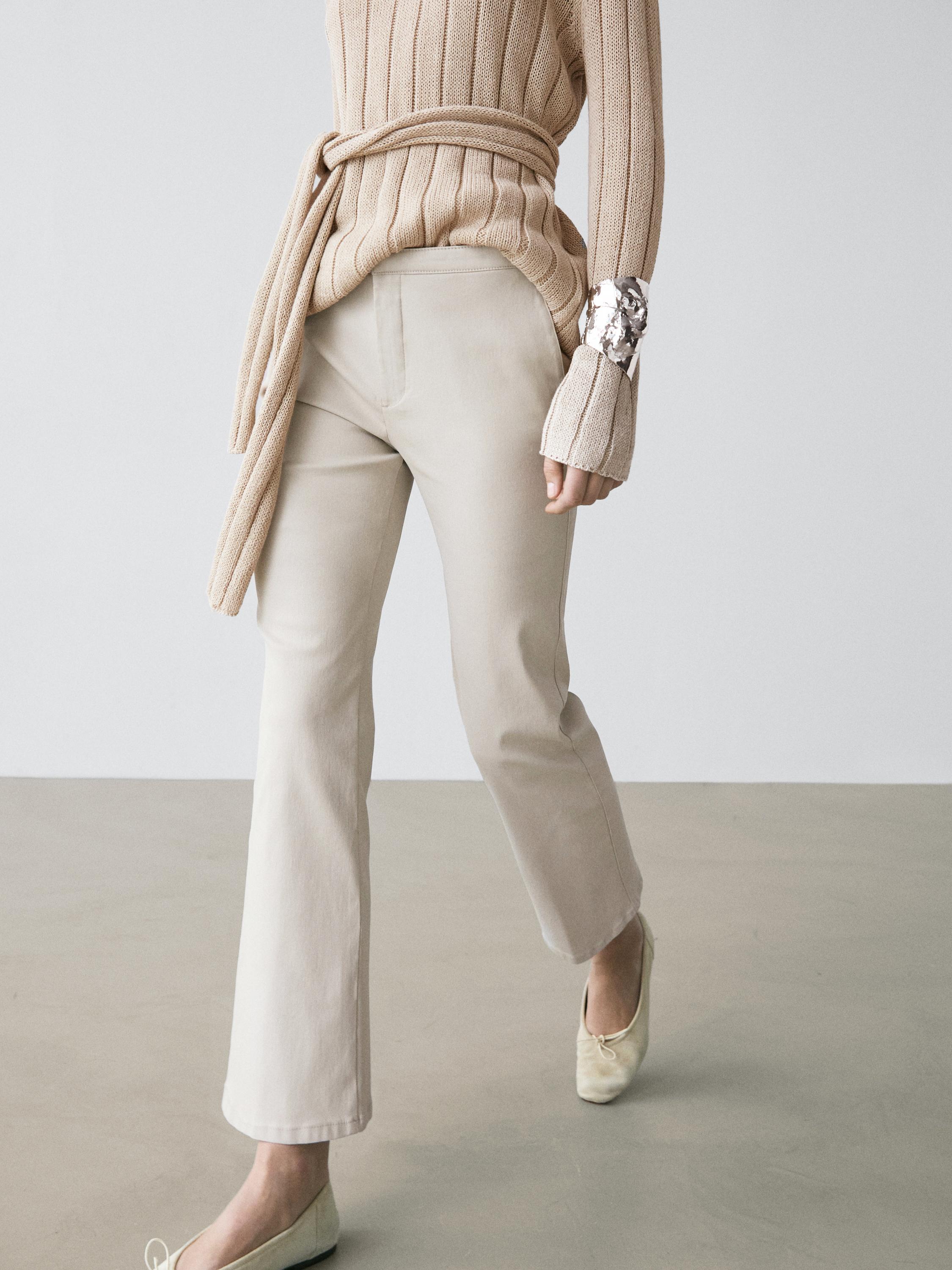 Pantalón flare fit tiro medio encerado