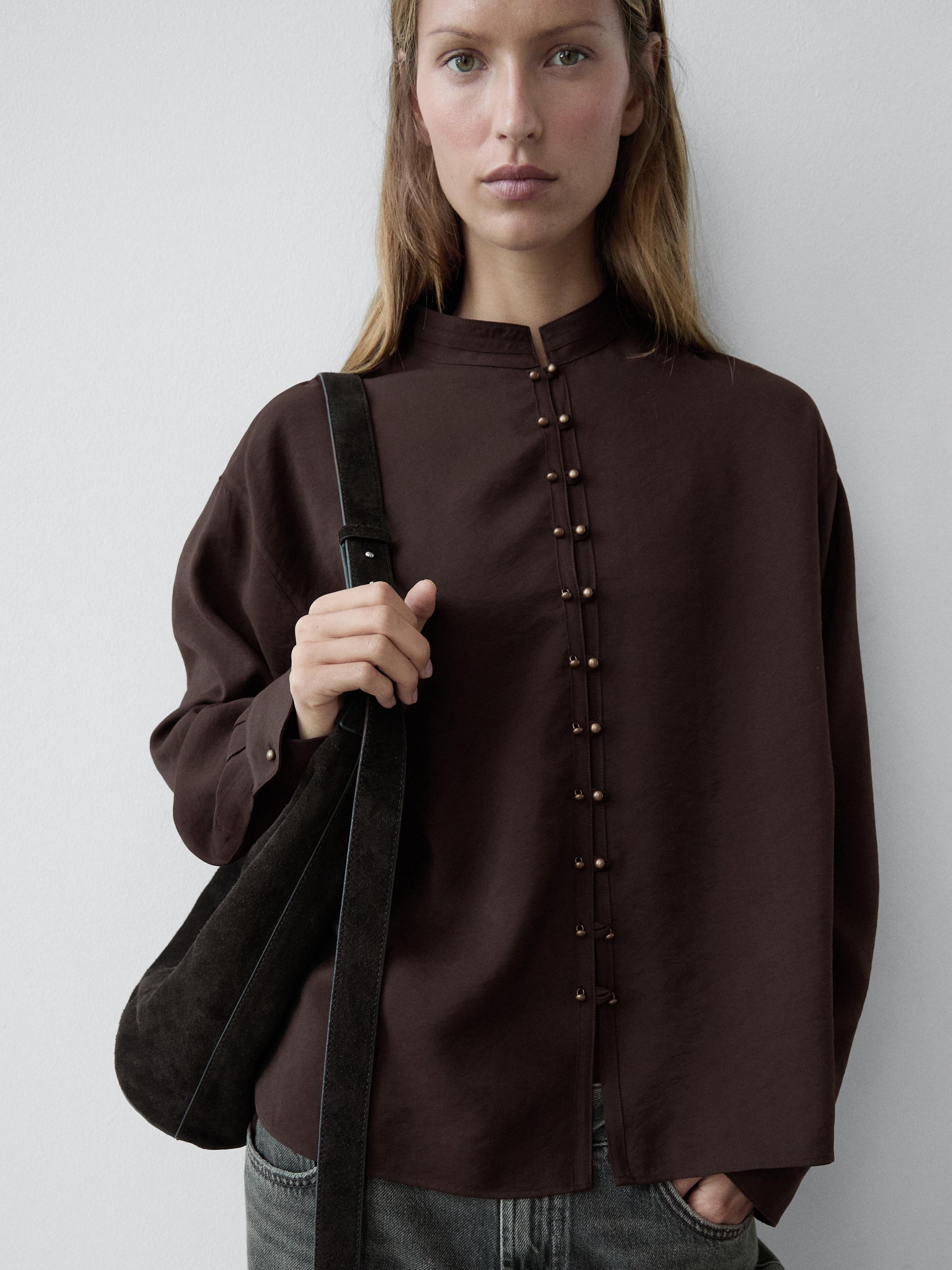 Camisa fluida detalle botones