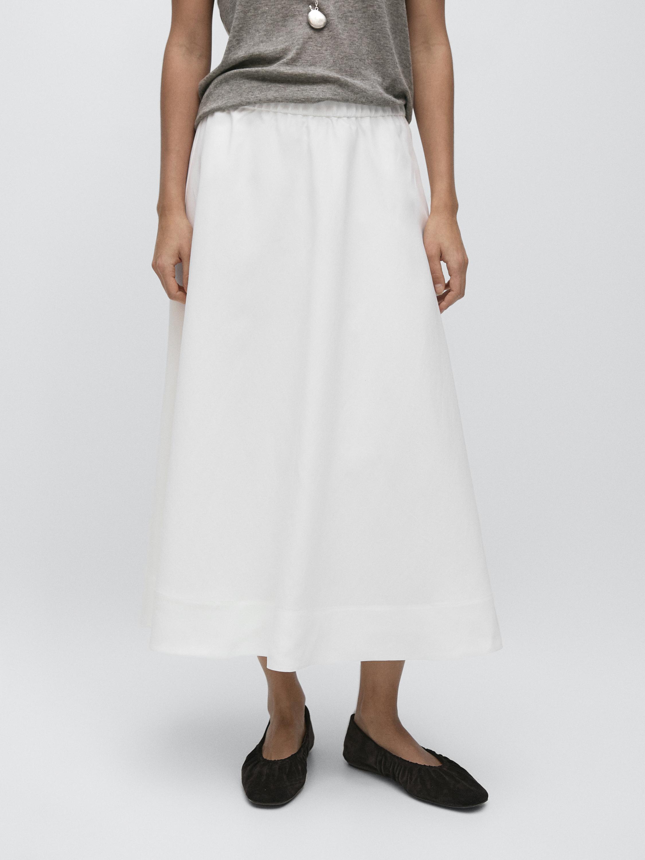 Falda midi fluida detalle goma