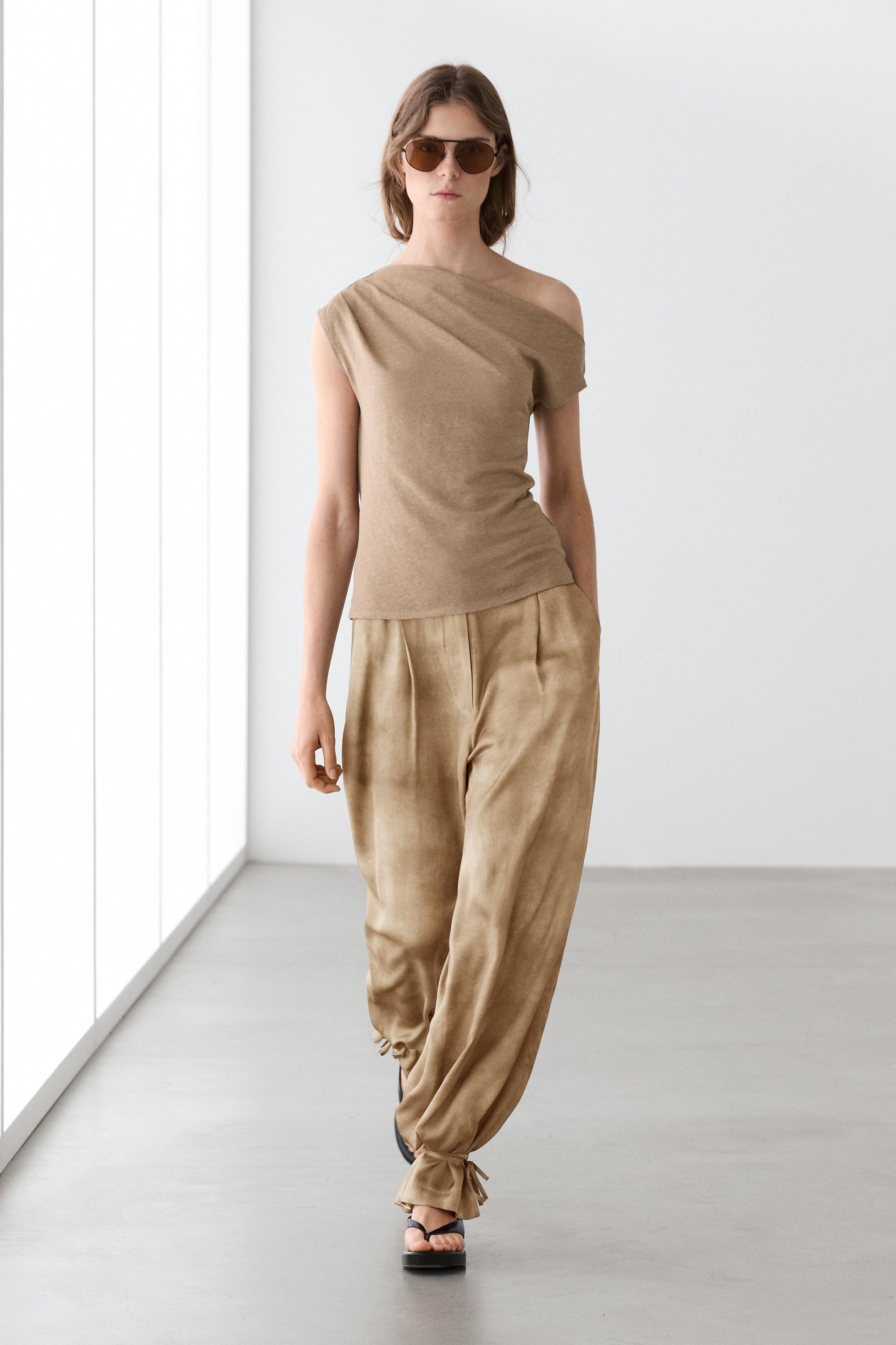 Top asimétrico detalle drapeado mezcla lino