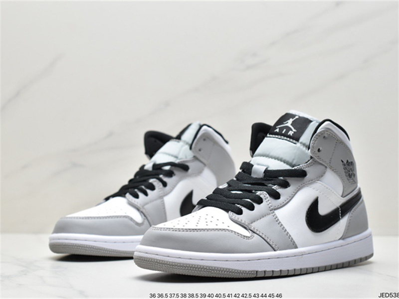 Air Jordan 1 Mid black and white purple