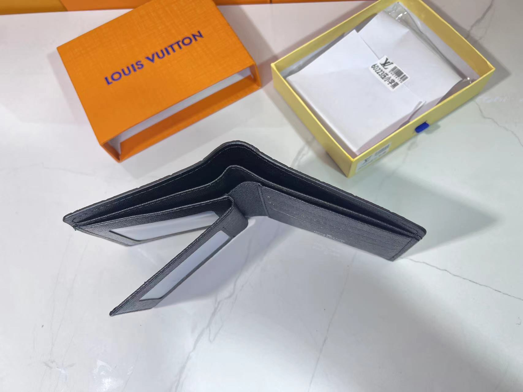 Printed wallet with all-over printing of small flowers