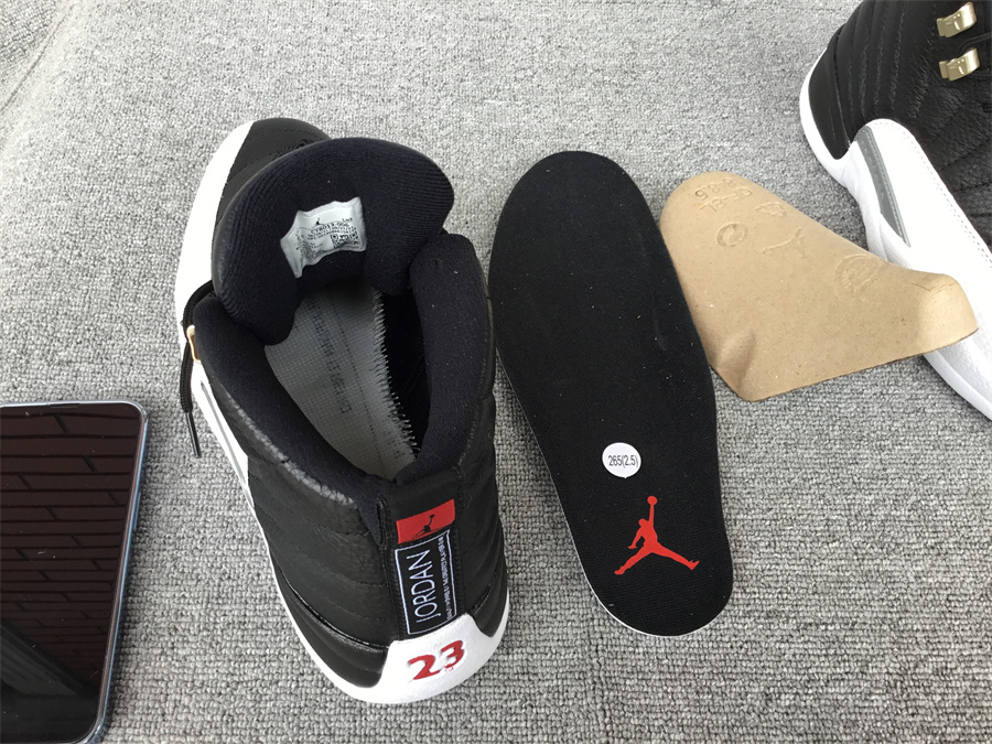 Air Jordan 12 playoffs black and white silver buckle